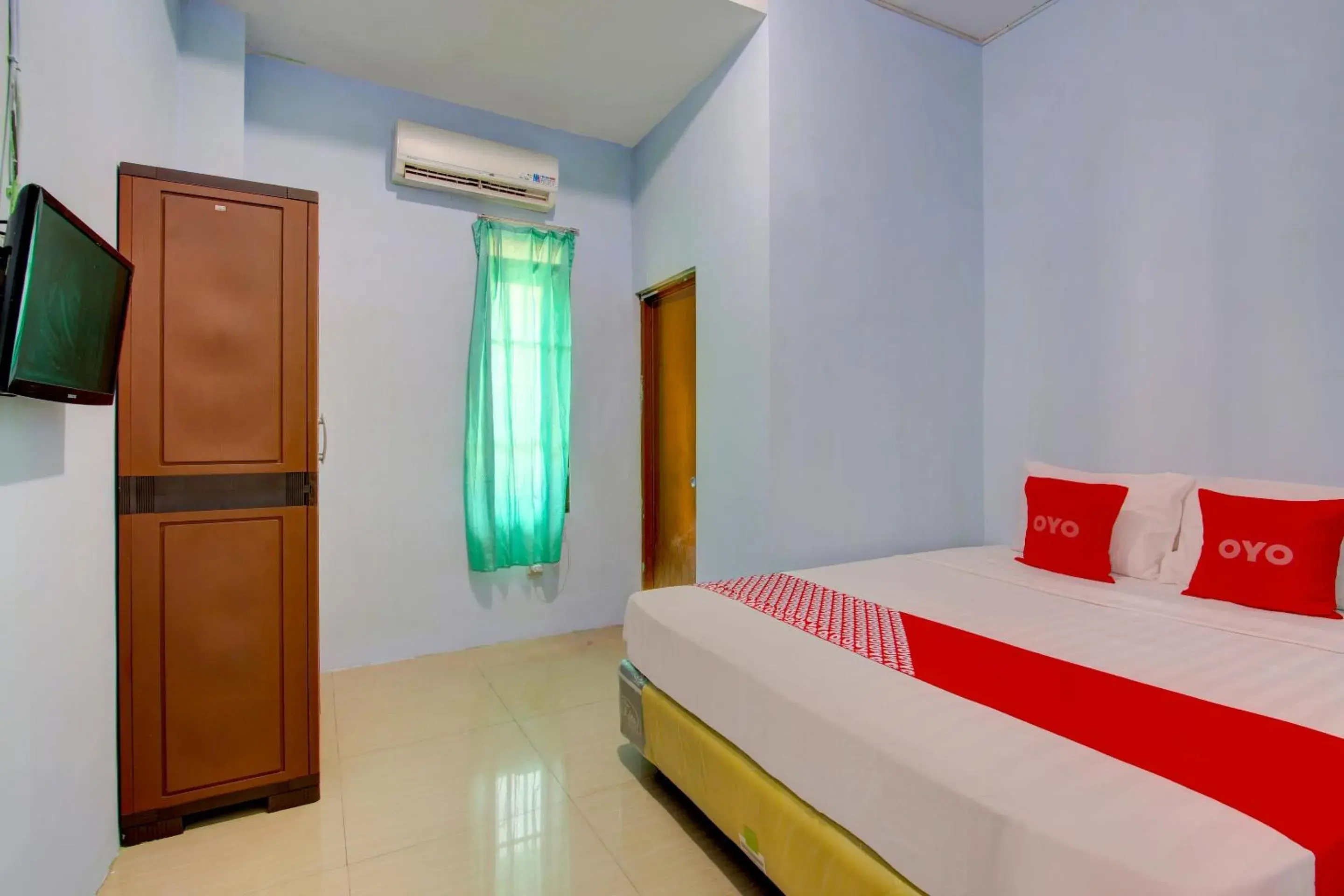 Deluxe Double Room in Hotel O Griya Kencana Asri Syariah Deluxe Double Room in Hotel O Griya Kencana Asri Syariah