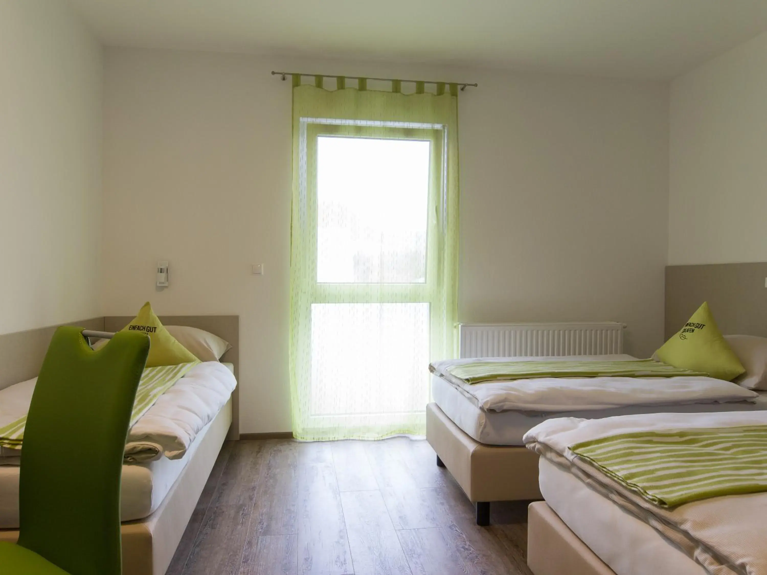 Multi Bed Room Standard in Smart Motel Multi Bed Room Standard in Smart Motel