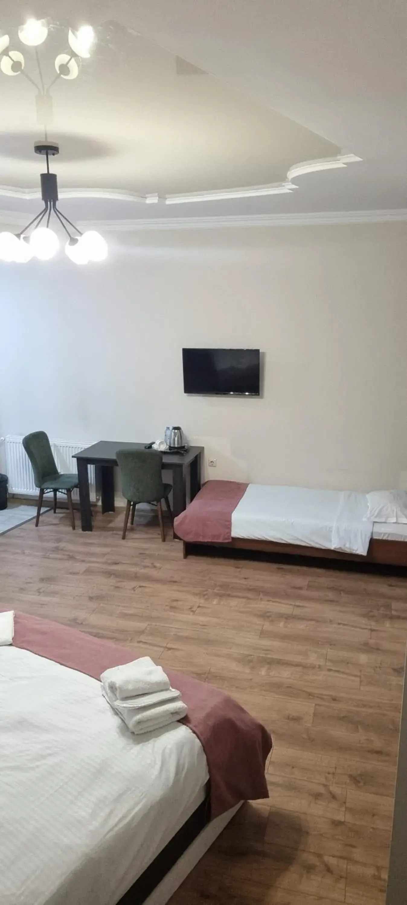 Triple Room with Balcony in MAHALI HOTEL Triple Room with Balcony in MAHALI HOTEL