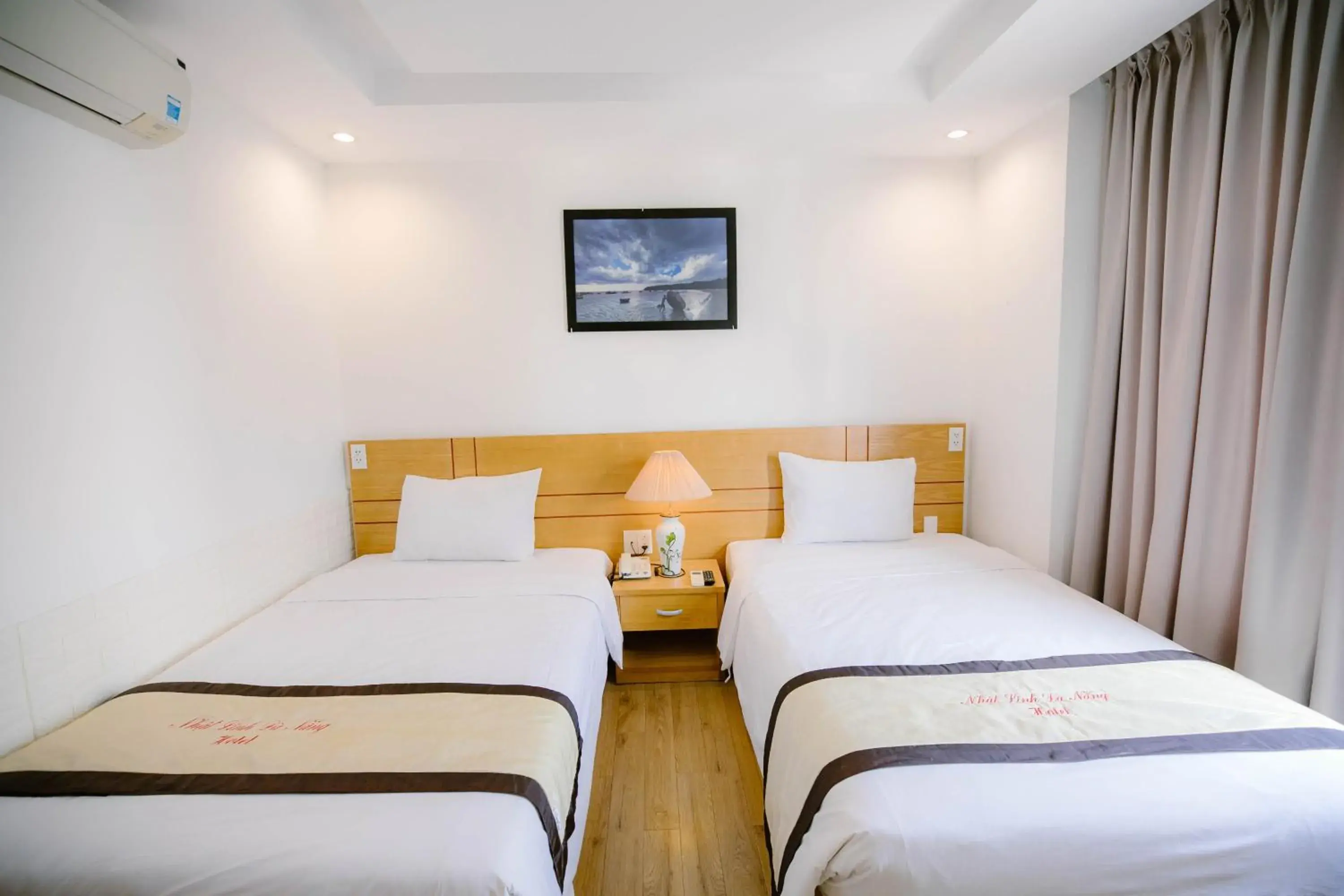 Superior Twin Room in Nhat Linh Hotel & Suites Da Nang Superior Twin Room in Nhat Linh Hotel & Suites Da Nang