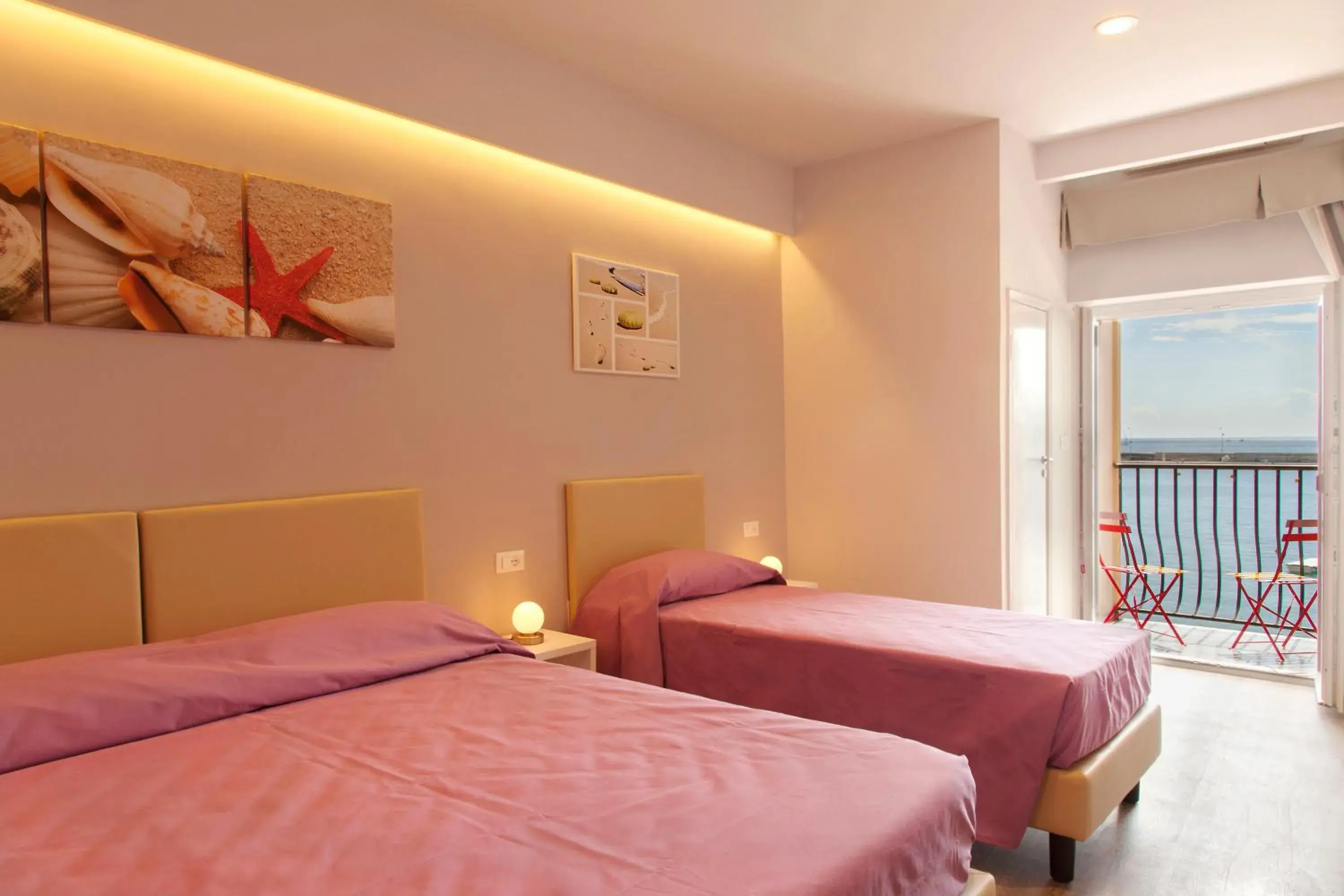 Quadruple Room with Balcony and Sea View in Hotel l'Approdo Quadruple Room with Balcony and Sea View in Hotel l'Approdo