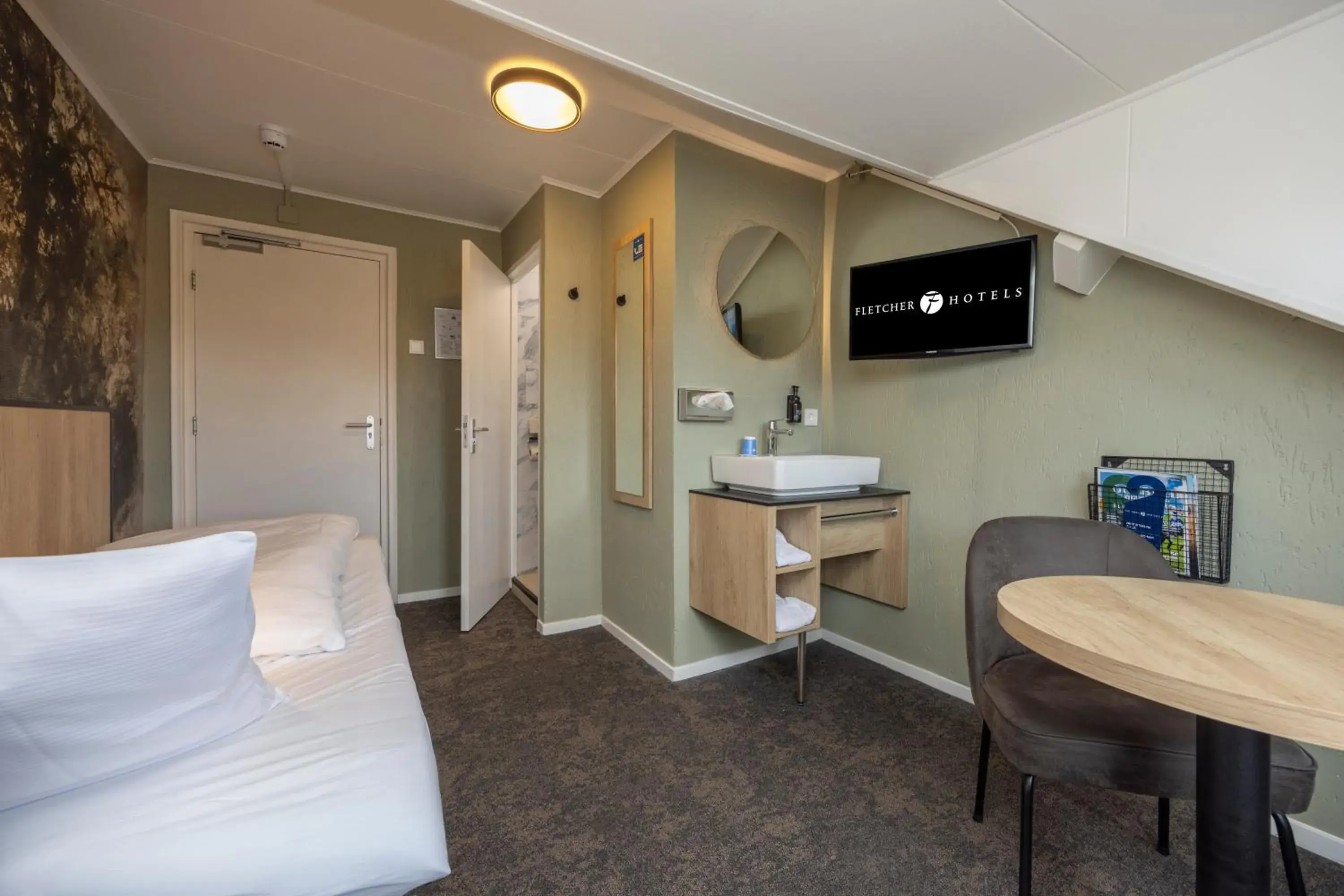 Single Room in Fletcher Hotel Restaurant Bon Repos Single Room in Fletcher Hotel Restaurant Bon Repos