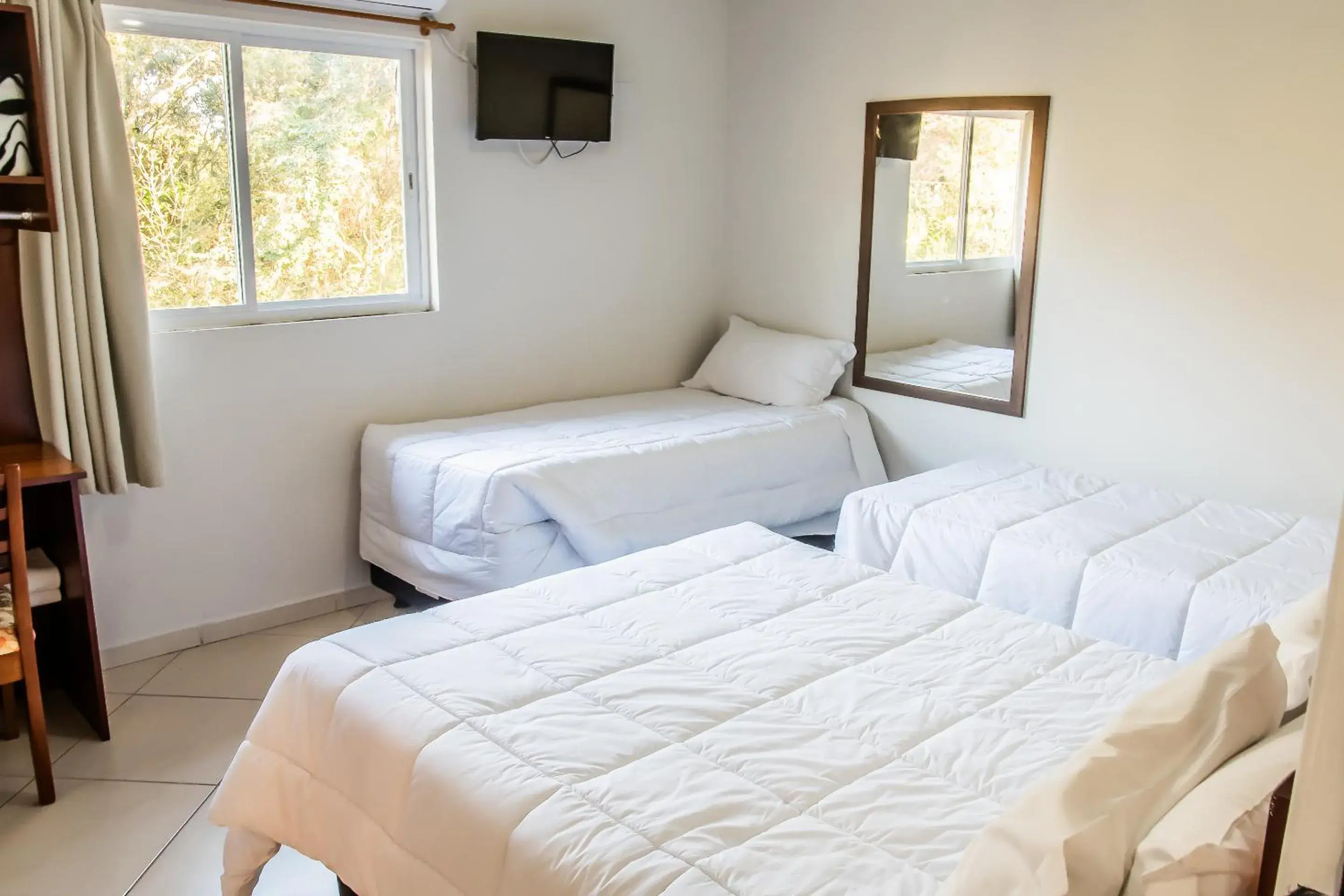 Quadruple Room in Hotel Serra Canela Quadruple Room in Hotel Serra Canela