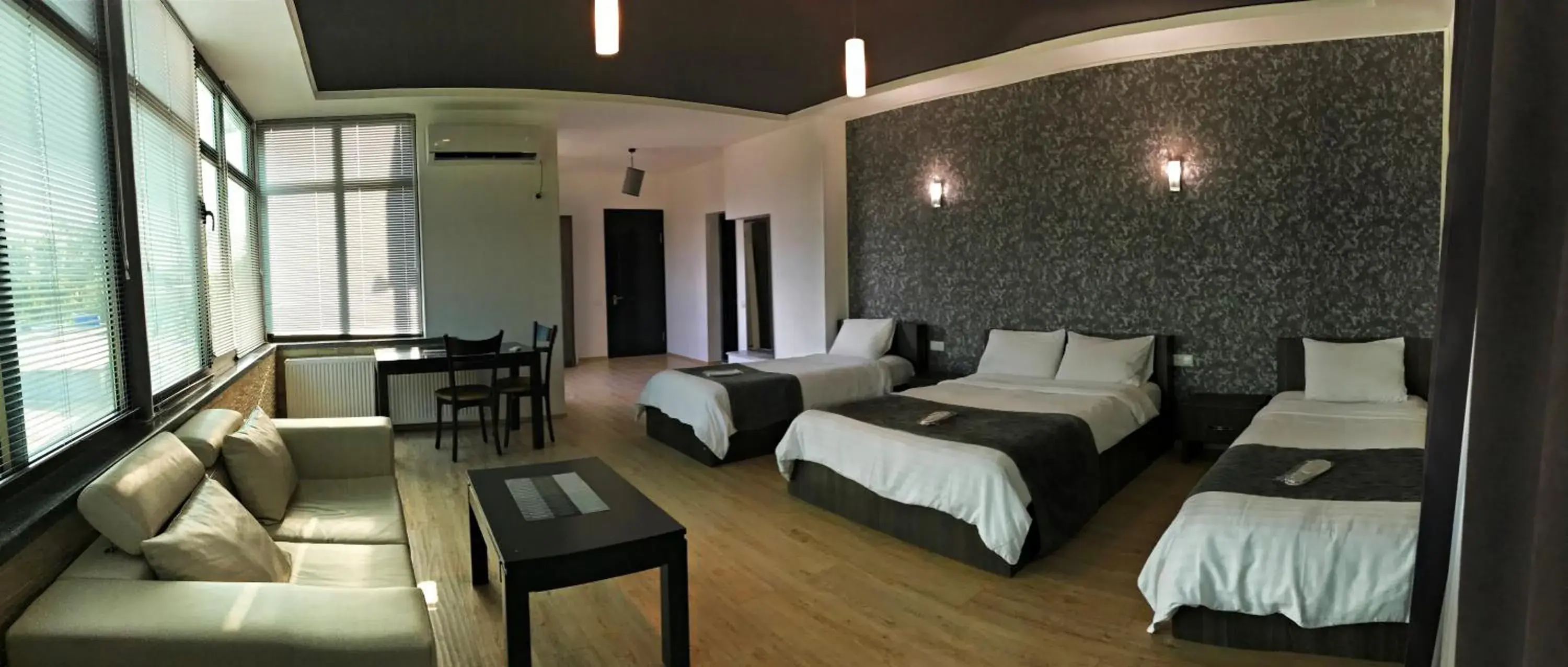 Family Room with Balcony in Continental Hotel Family Room with Balcony in Continental Hotel