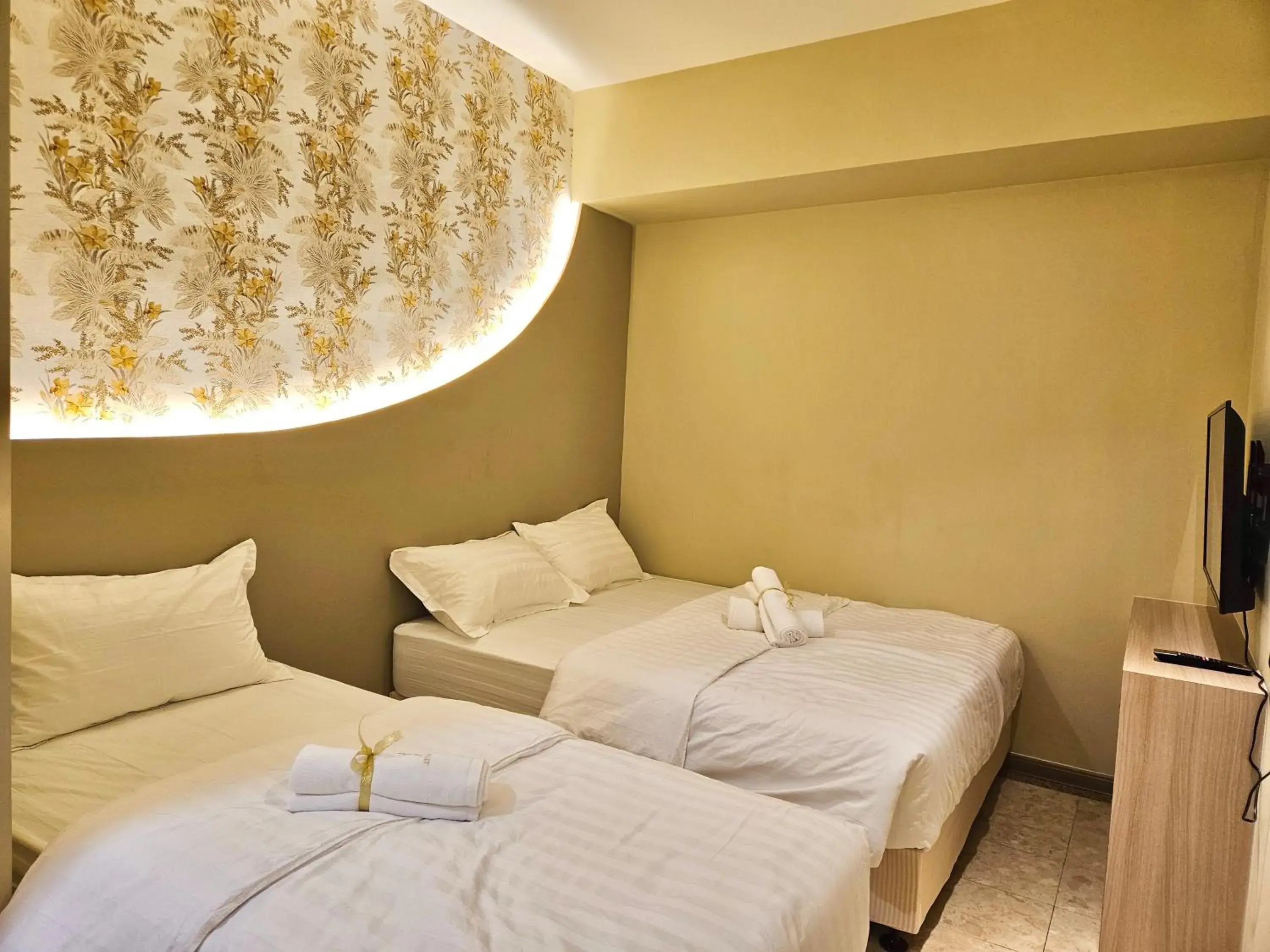 Superior Triple Room in Asimmy Hotel Superior Triple Room in Asimmy Hotel