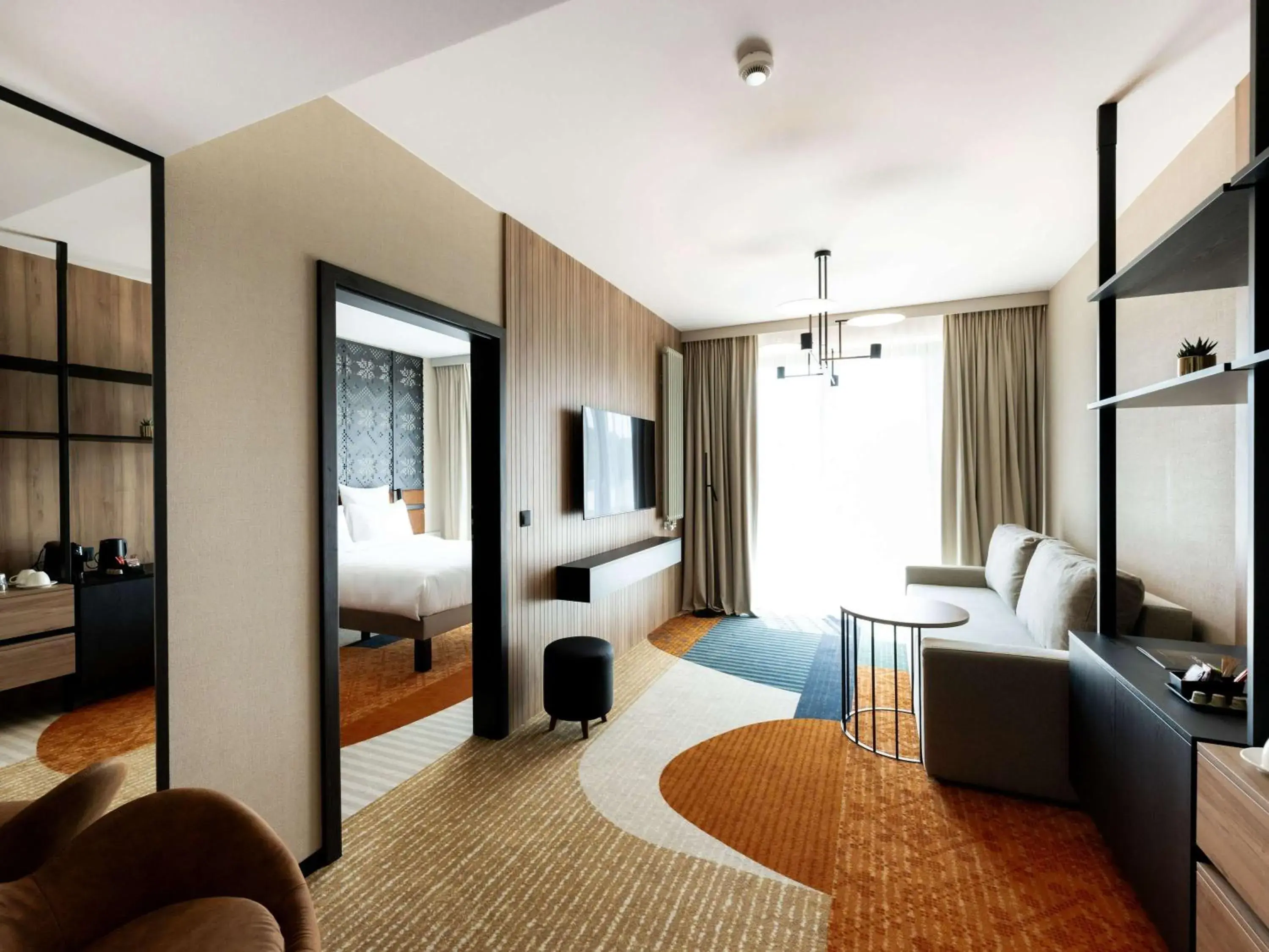 Junior Suite with a Double Bed and a Sofa in Mercure Szczyrk Resort Junior Suite with a Double Bed and a Sofa in Mercure Szczyrk Resort