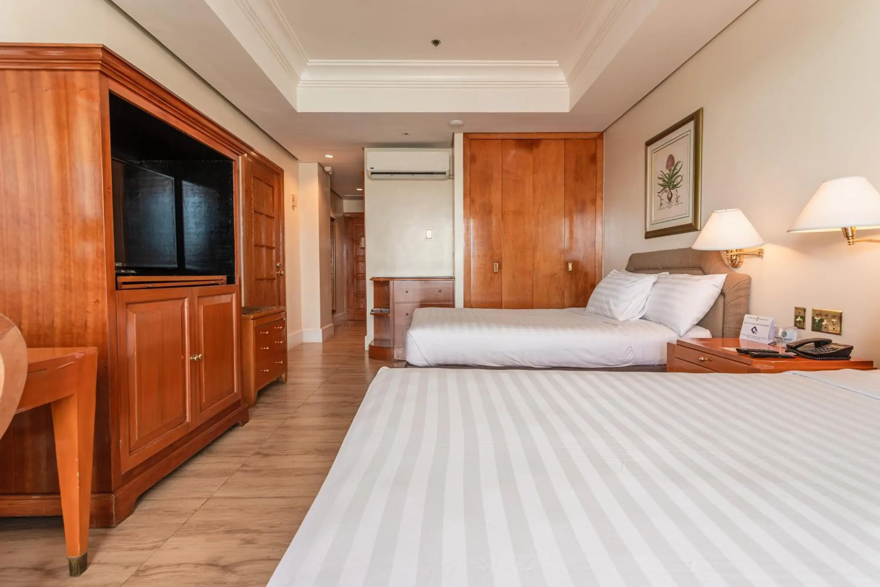 Deluxe Queen Room with Two Queen Beds - single occupancy in The Subic Bay Yacht Club, Inc. Deluxe Queen Room with Two Queen Beds - single occupancy in The Subic Bay Yacht Club, Inc.