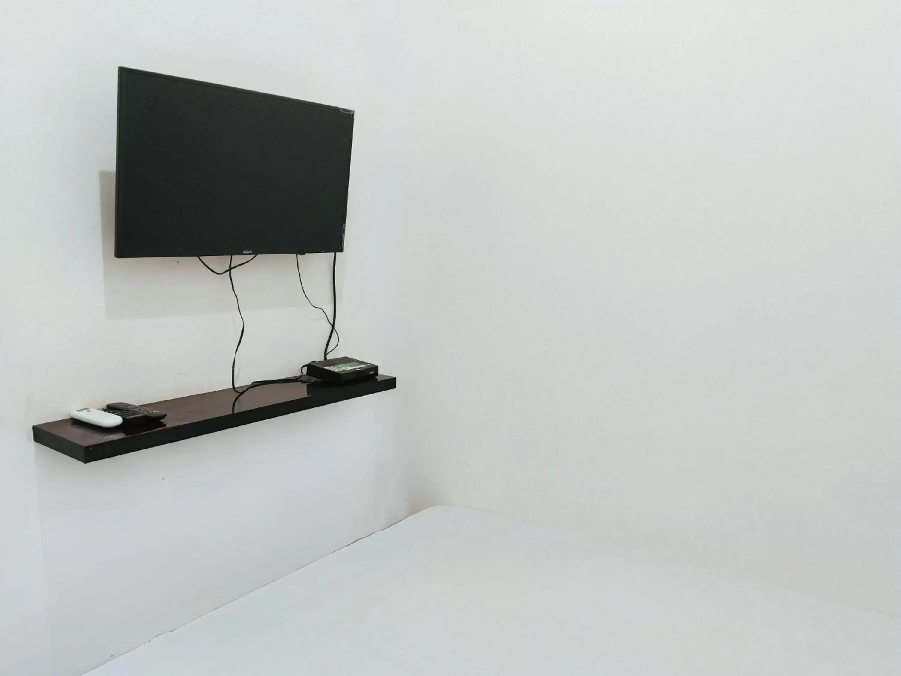 Deluxe Room in Eleven Guest House Syariah Deluxe Room in Eleven Guest House Syariah