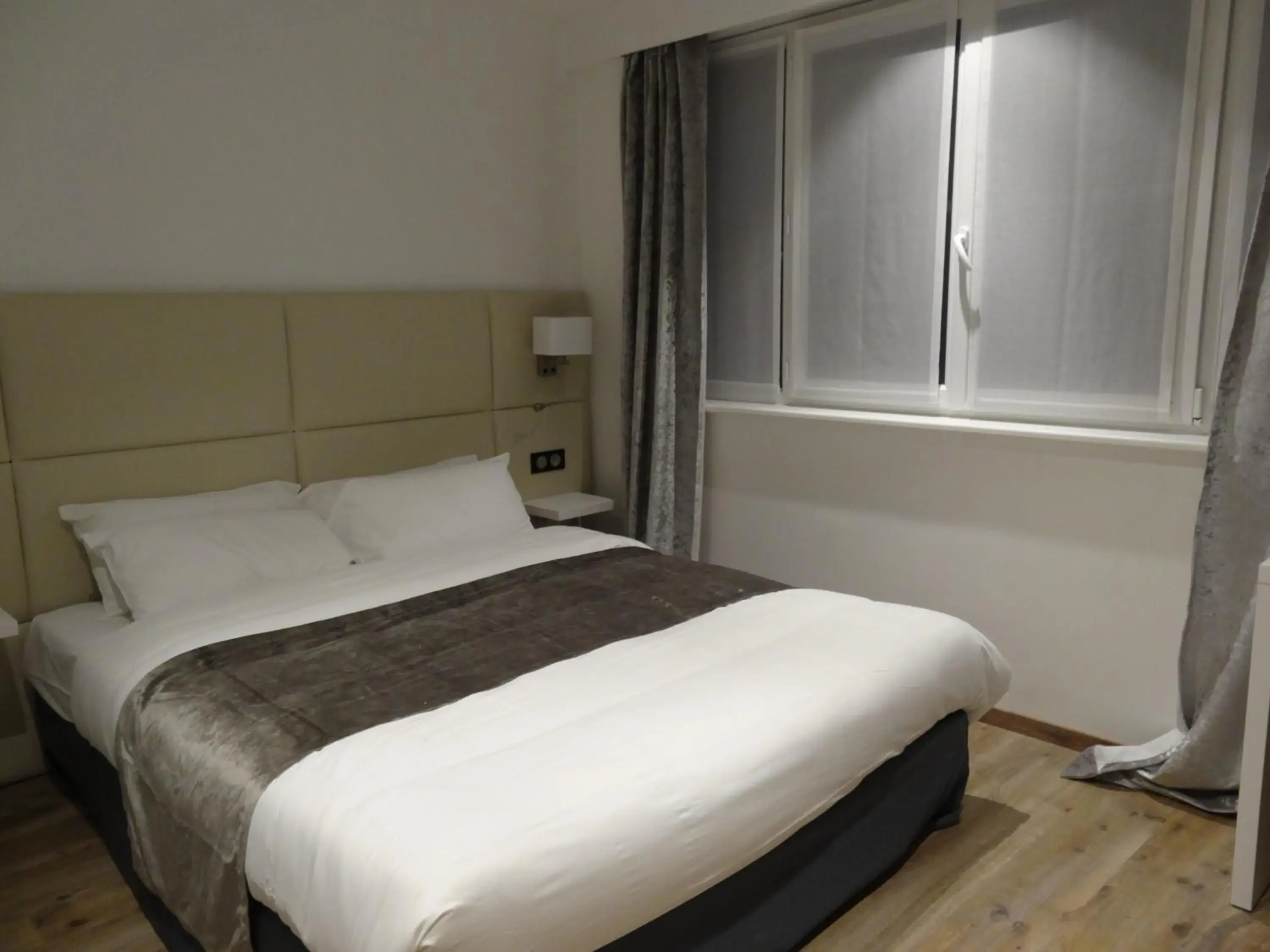 Family Room in Hôtel de la Paix Family Room in Hôtel de la Paix