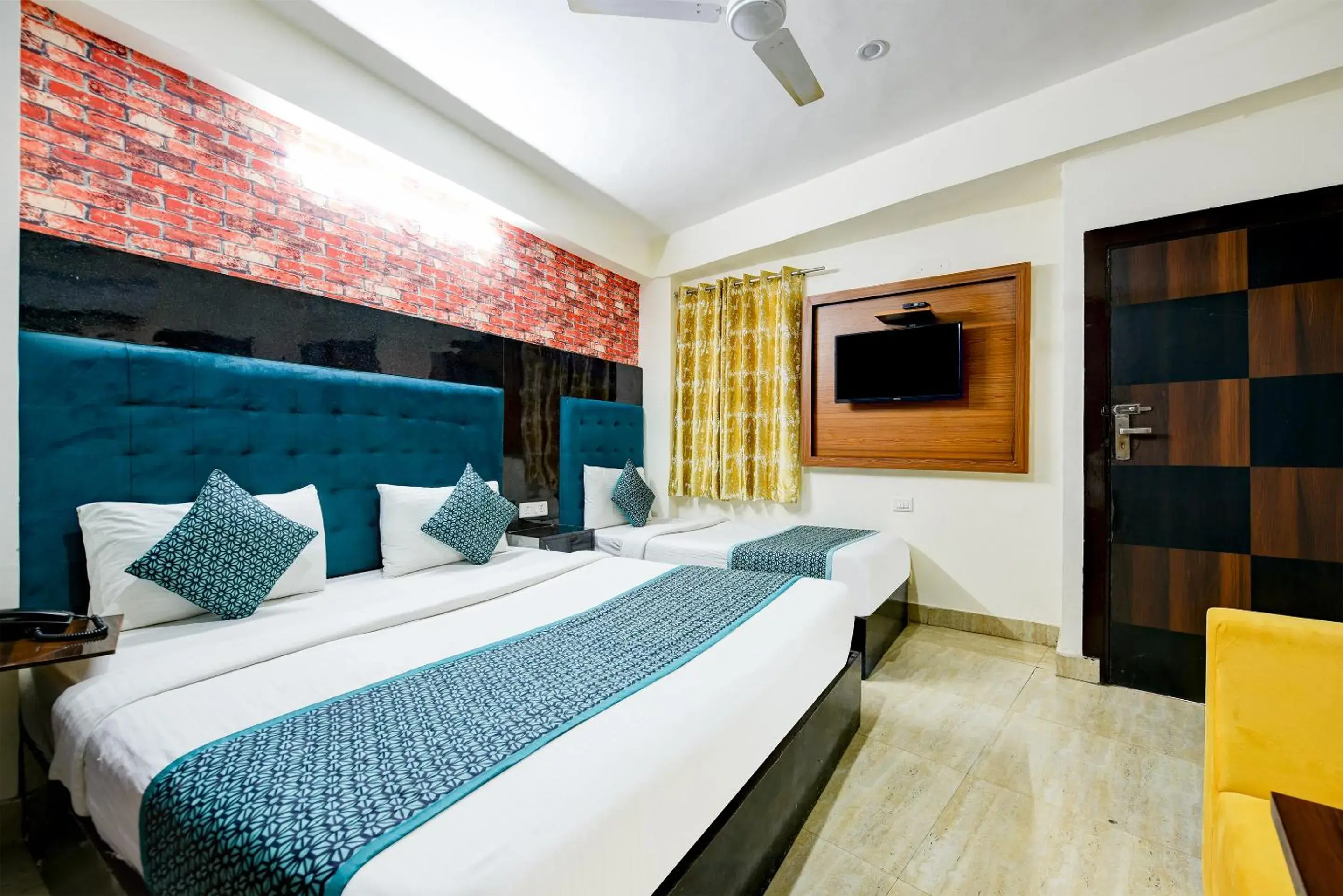 Deluxe Triple Room in Hotel Ark Suites At Airport Deluxe Triple Room in Hotel Ark Suites At Airport