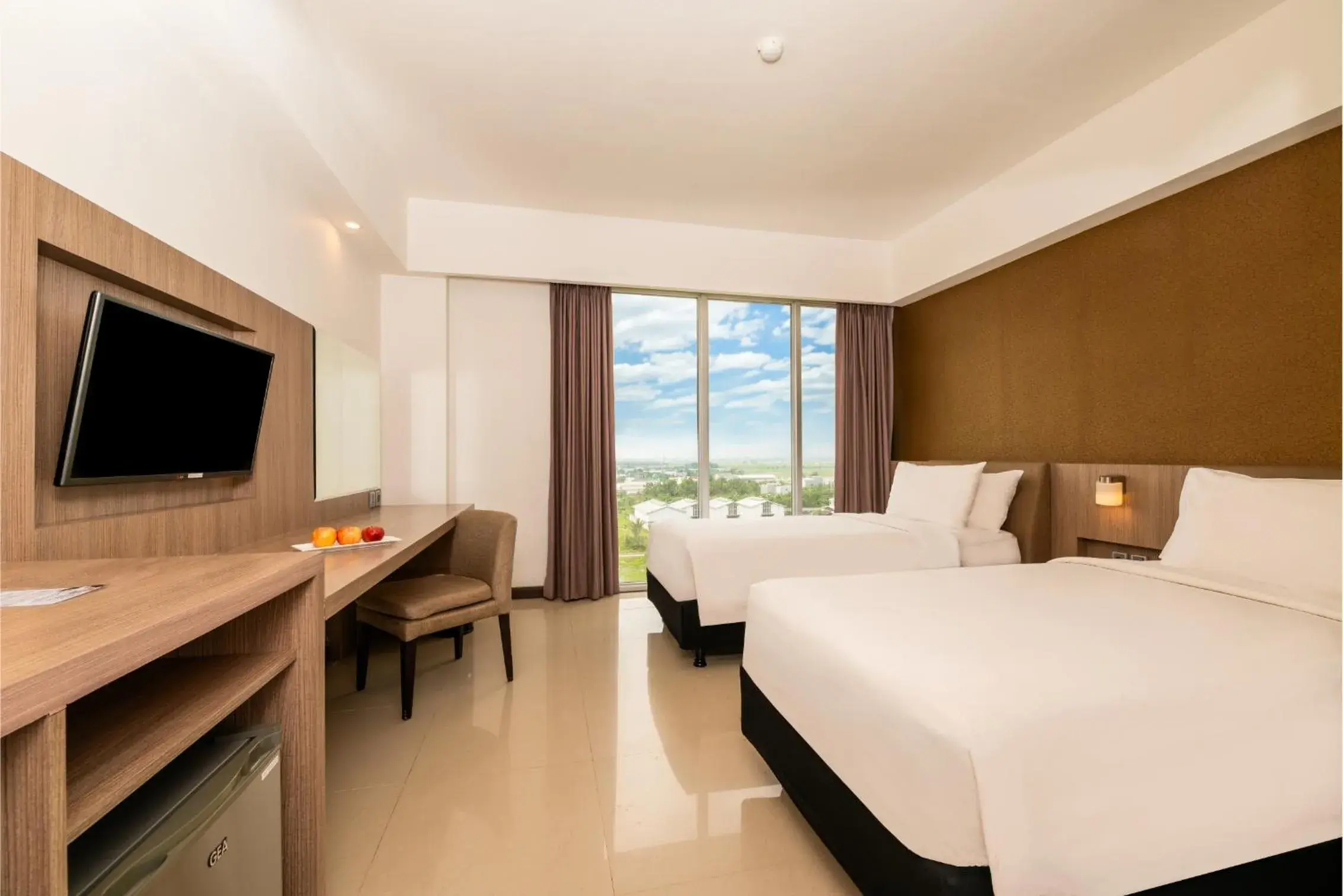 Deluxe Twin Room in Grand Tan Banjarmasin Hotel & Convention Center Deluxe Twin Room in Grand Tan Banjarmasin Hotel & Convention Center