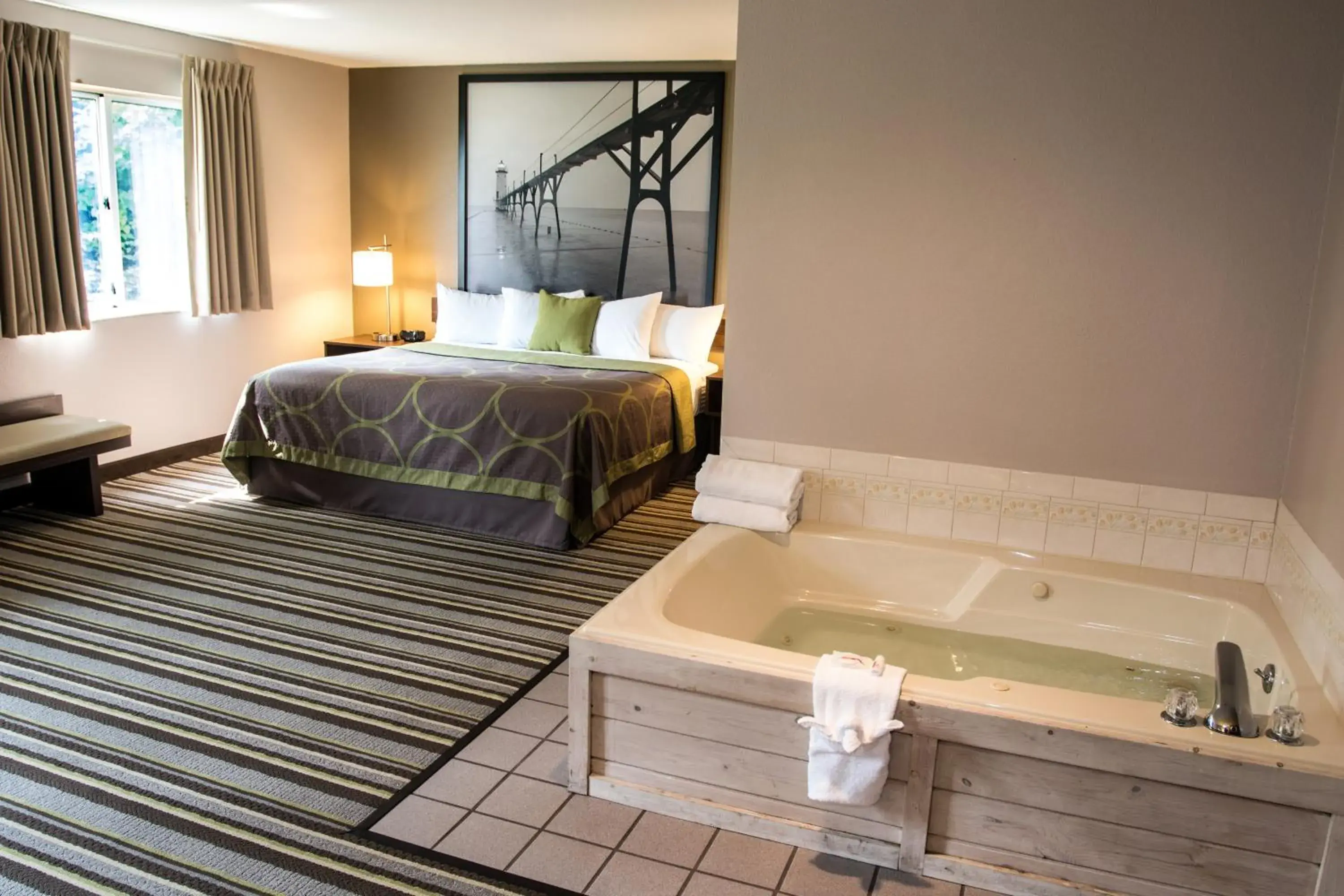 Deluxe King Suite - Non-Smoking in Super 8 by Wyndham Manistee Deluxe King Suite - Non-Smoking in Super 8 by Wyndham Manistee