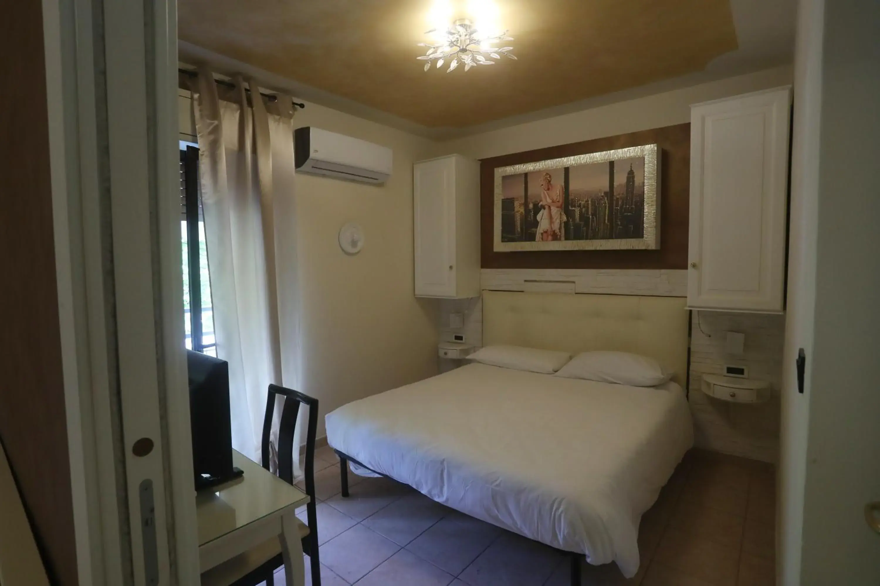 Family Room with Balcony in Hotel Central Giacomini Family Room with Balcony in Hotel Central Giacomini