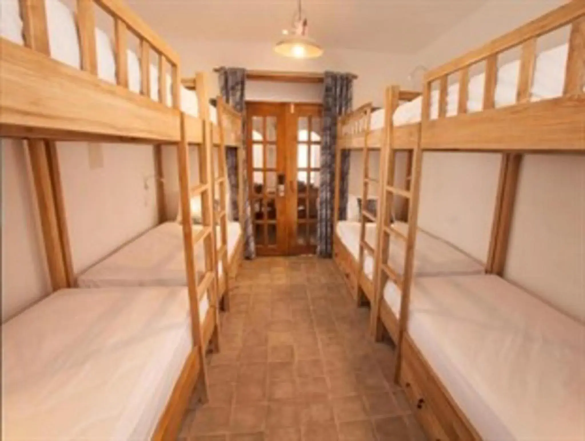 8-Bed Mixed Dormitory Room in Adhisthana Hotel Yogyakarta 8-Bed Mixed Dormitory Room in Adhisthana Hotel Yogyakarta