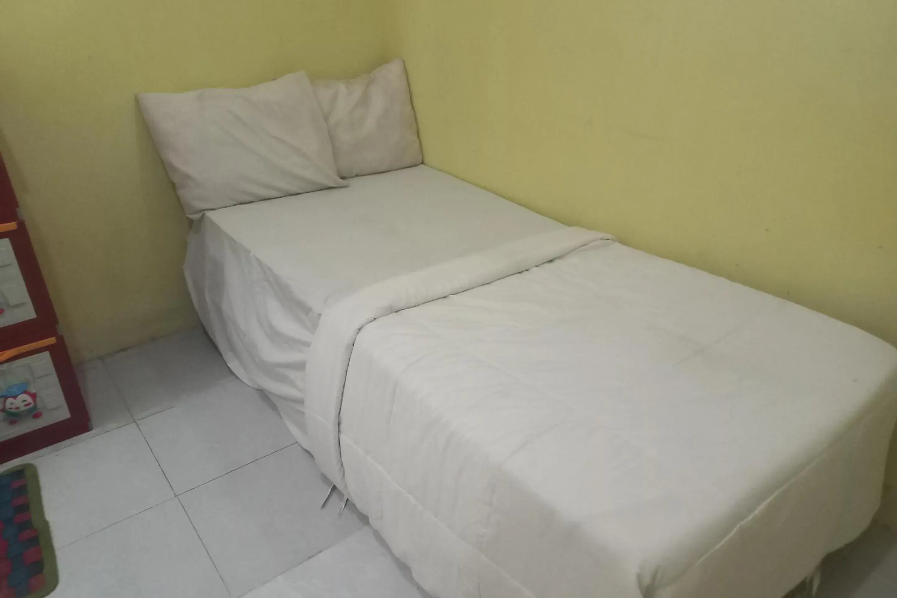 Budget Double Room in Hotel O Kost Zalfa Amalia Syariah Budget Double Room in Hotel O Kost Zalfa Amalia Syariah