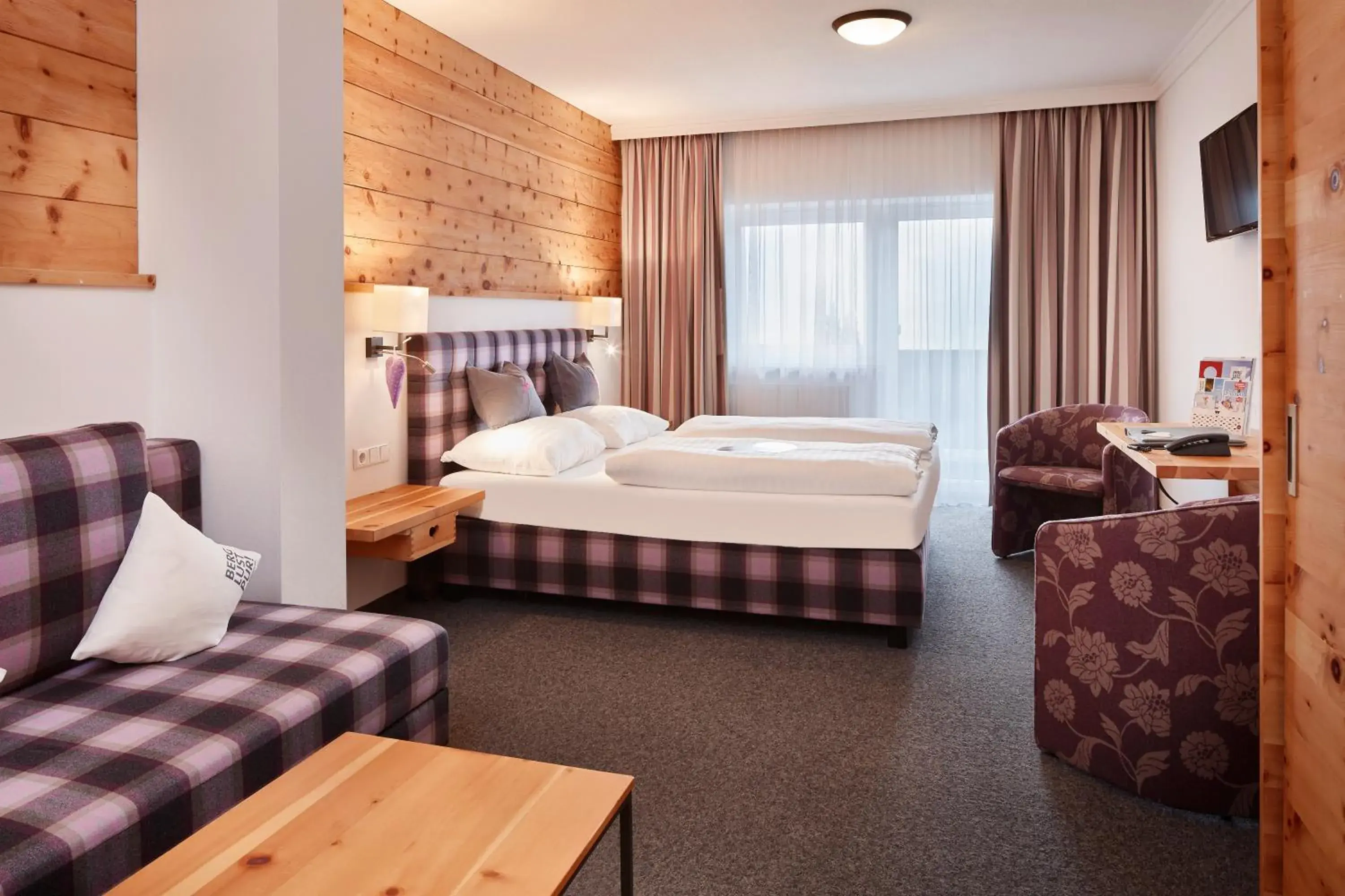 Comfort Quadruple Room in Hotel Gassner - 4 Sterne Superior Comfort Quadruple Room in Hotel Gassner - 4 Sterne Superior