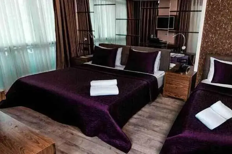 Triple Room with Balcony in ATAKUM PALAS OTEL Triple Room with Balcony in ATAKUM PALAS OTEL