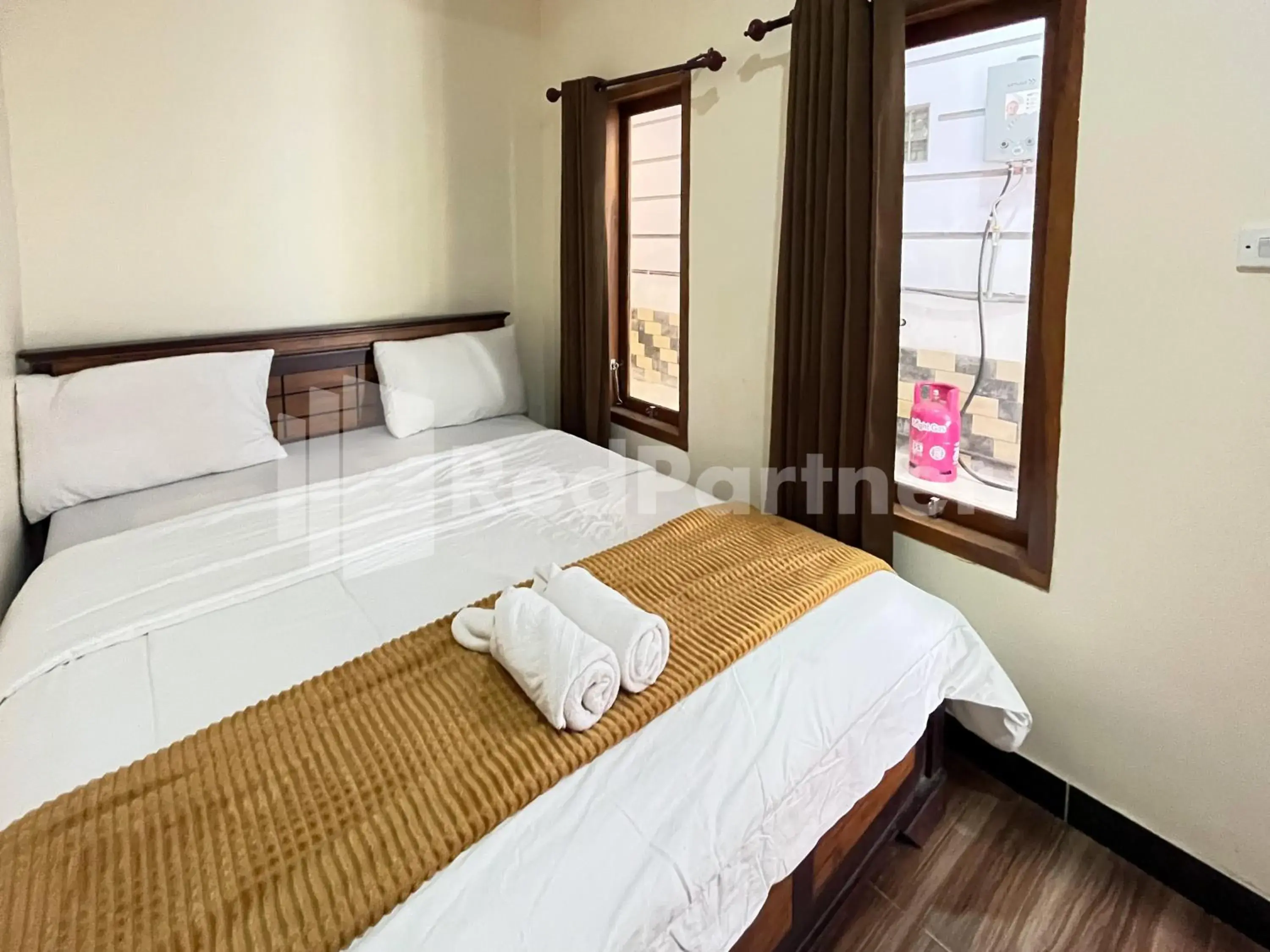 Standard Double Room in Family Homestay Syariah Bromo Mitra RedDoorz Standard Double Room in Family Homestay Syariah Bromo Mitra RedDoorz