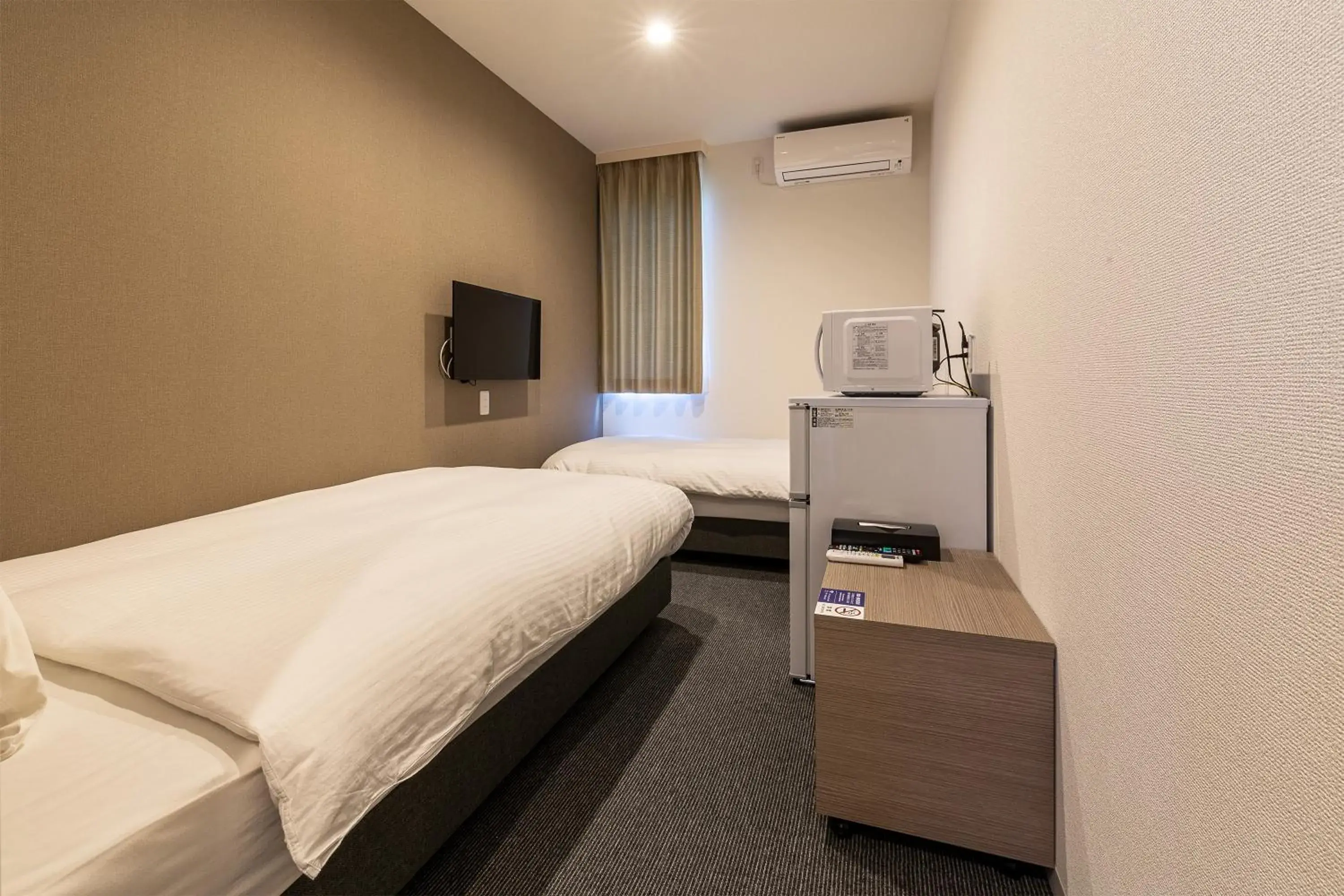 Standard Twin Room - single occupancy in HOTEL R9 The Yard Omura Standard Twin Room - single occupancy in HOTEL R9 The Yard Omura