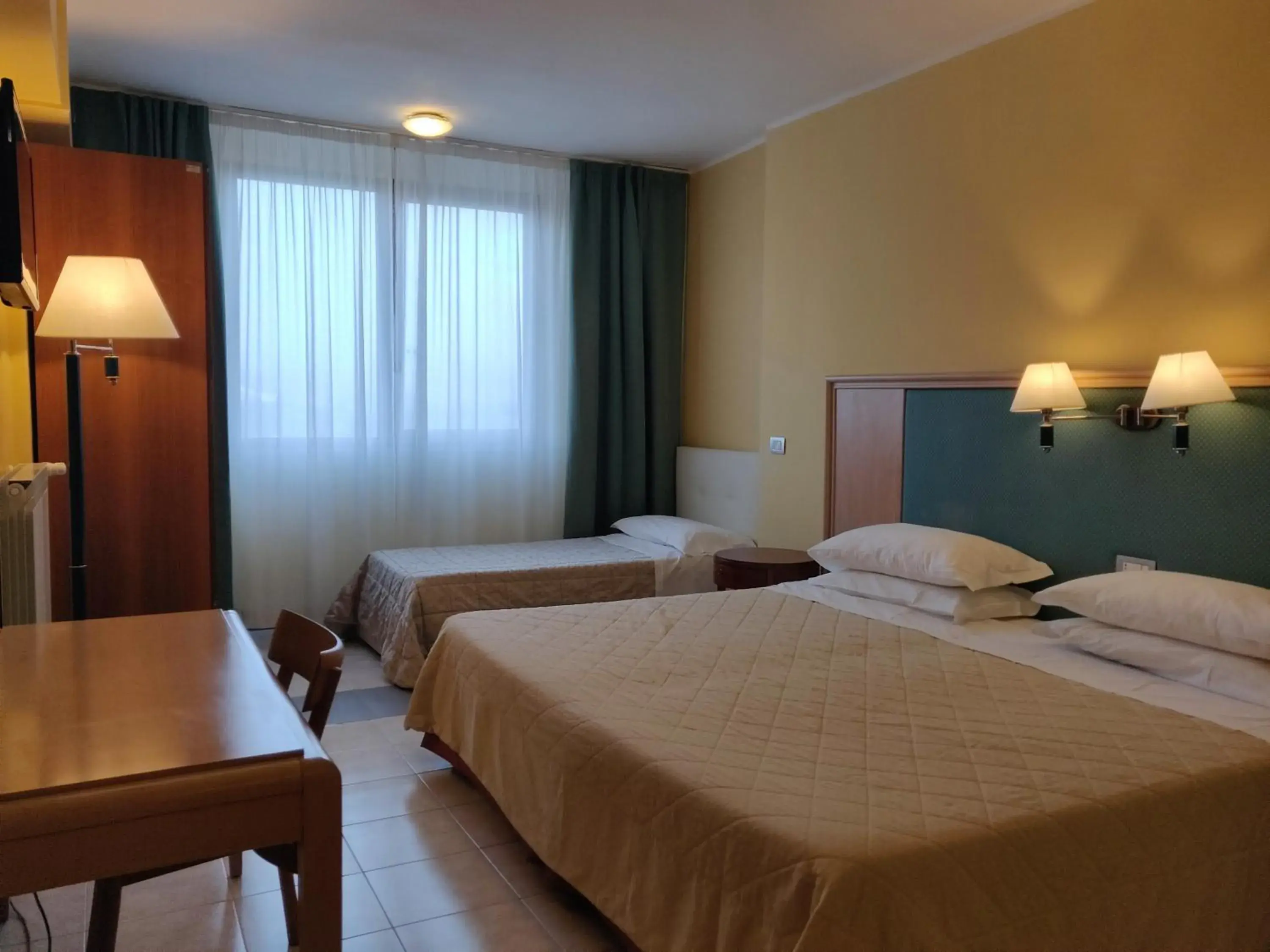 Standard Triple Room in Albergo Conte Max Standard Triple Room in Albergo Conte Max