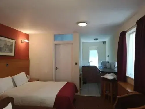 Family Room (2 Adults + 2 Children) in The Tudor Hotel Family Room (2 Adults + 2 Children) in The Tudor Hotel