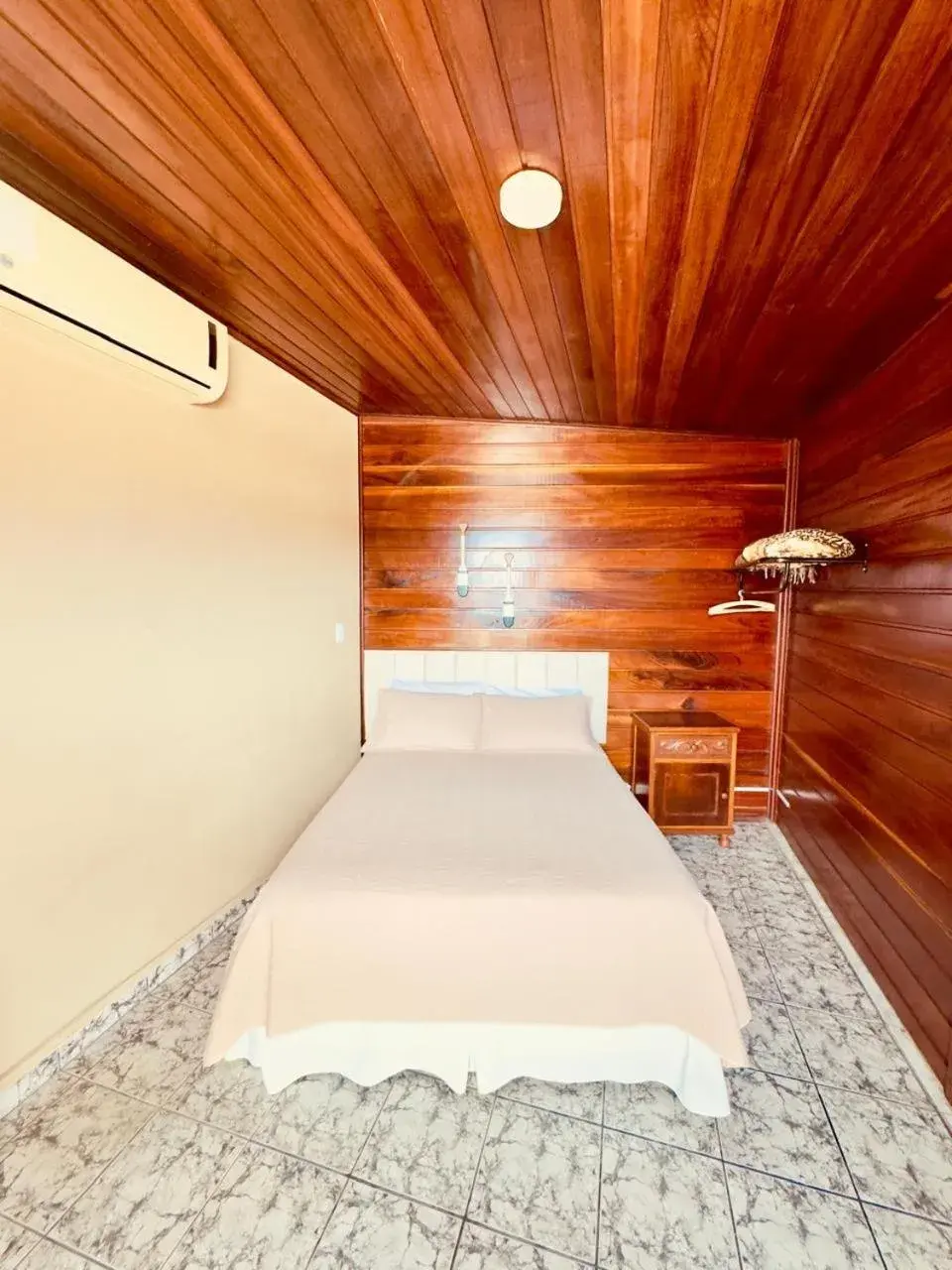 Superior Quadruple Room - single occupancy in Pousada Amanhecer do Itaguá Superior Quadruple Room - single occupancy in Pousada Amanhecer do Itaguá