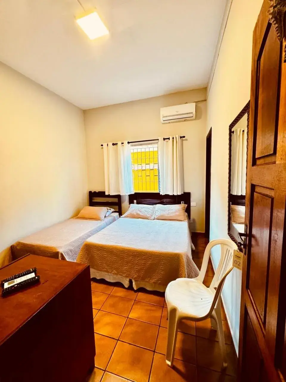 Triple Room - single occupancy in Pousada Amanhecer do Itaguá Triple Room - single occupancy in Pousada Amanhecer do Itaguá