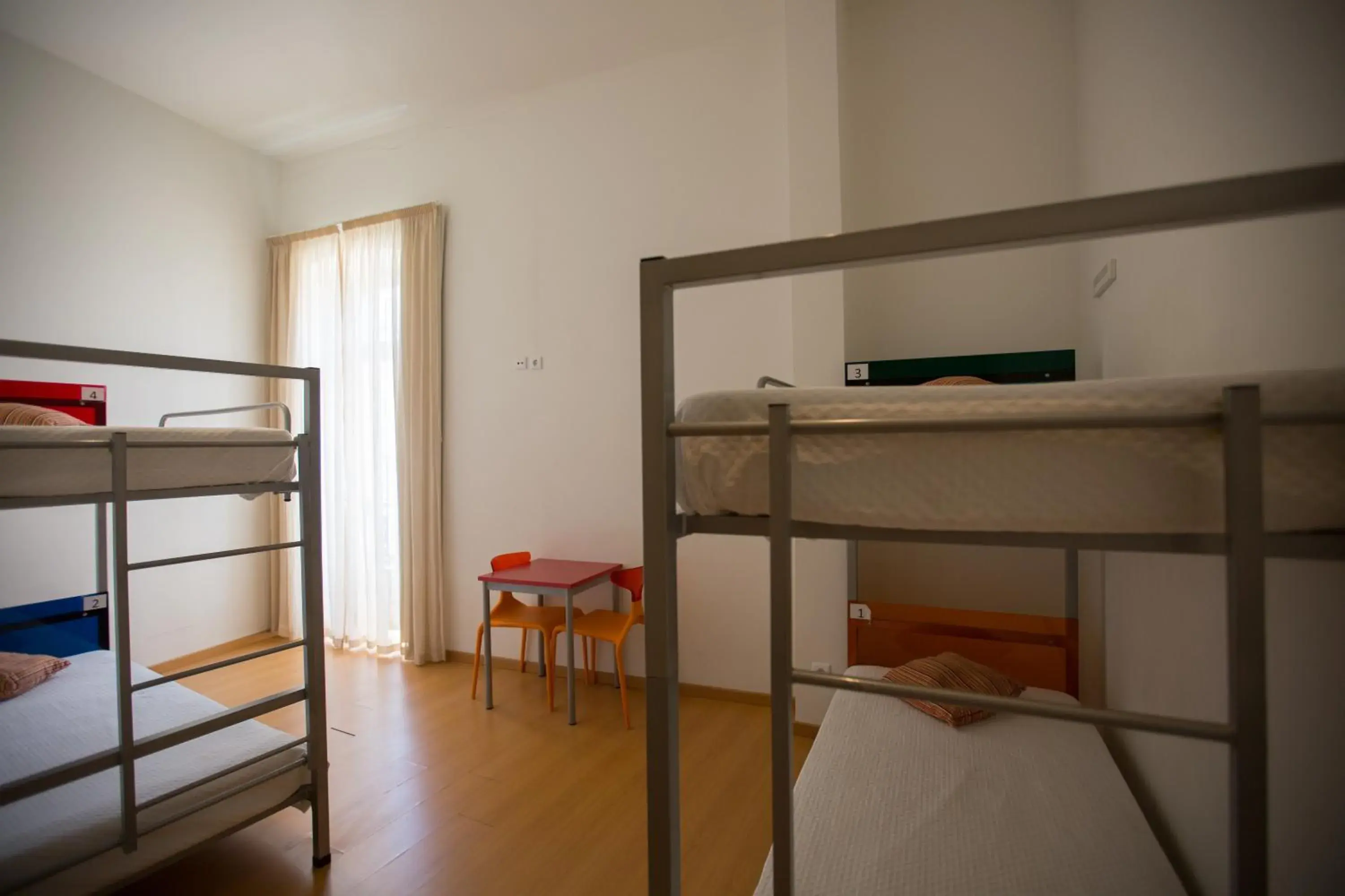 Bed in 4-Bed Male Dormitory Room in HI Tavira – Pousada de Juventude Bed in 4-Bed Male Dormitory Room in HI Tavira – Pousada de Juventude