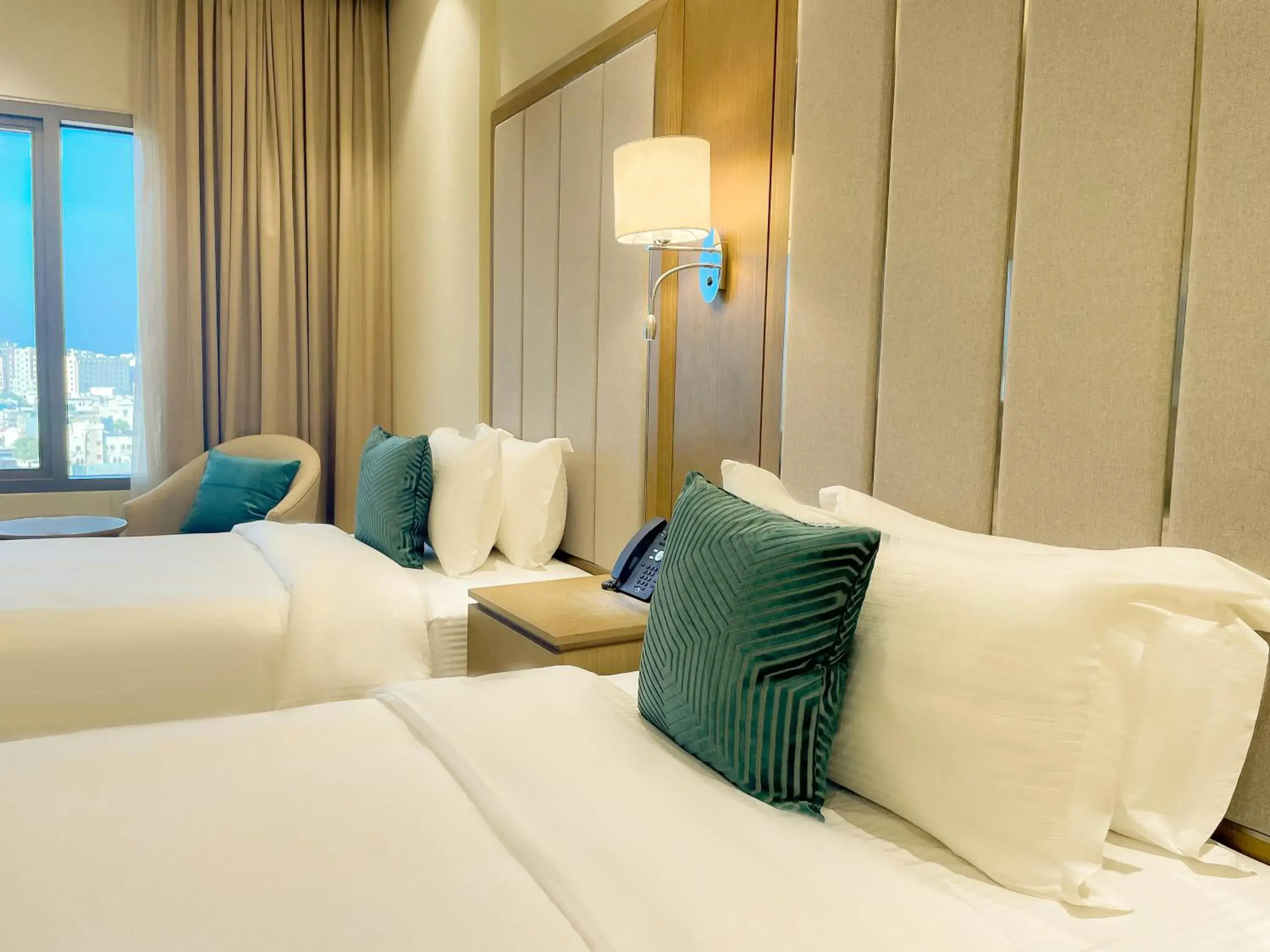 Deluxe Twin Room with Sea and City View in Mercure Muscat Deluxe Twin Room with Sea and City View in Mercure Muscat