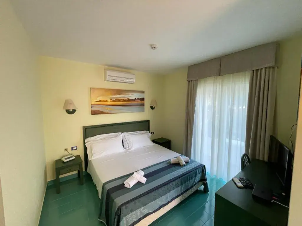 Comfort Quadruple Room in AH Premium Baia dei Faraglioni Comfort Quadruple Room in AH Premium Baia dei Faraglioni