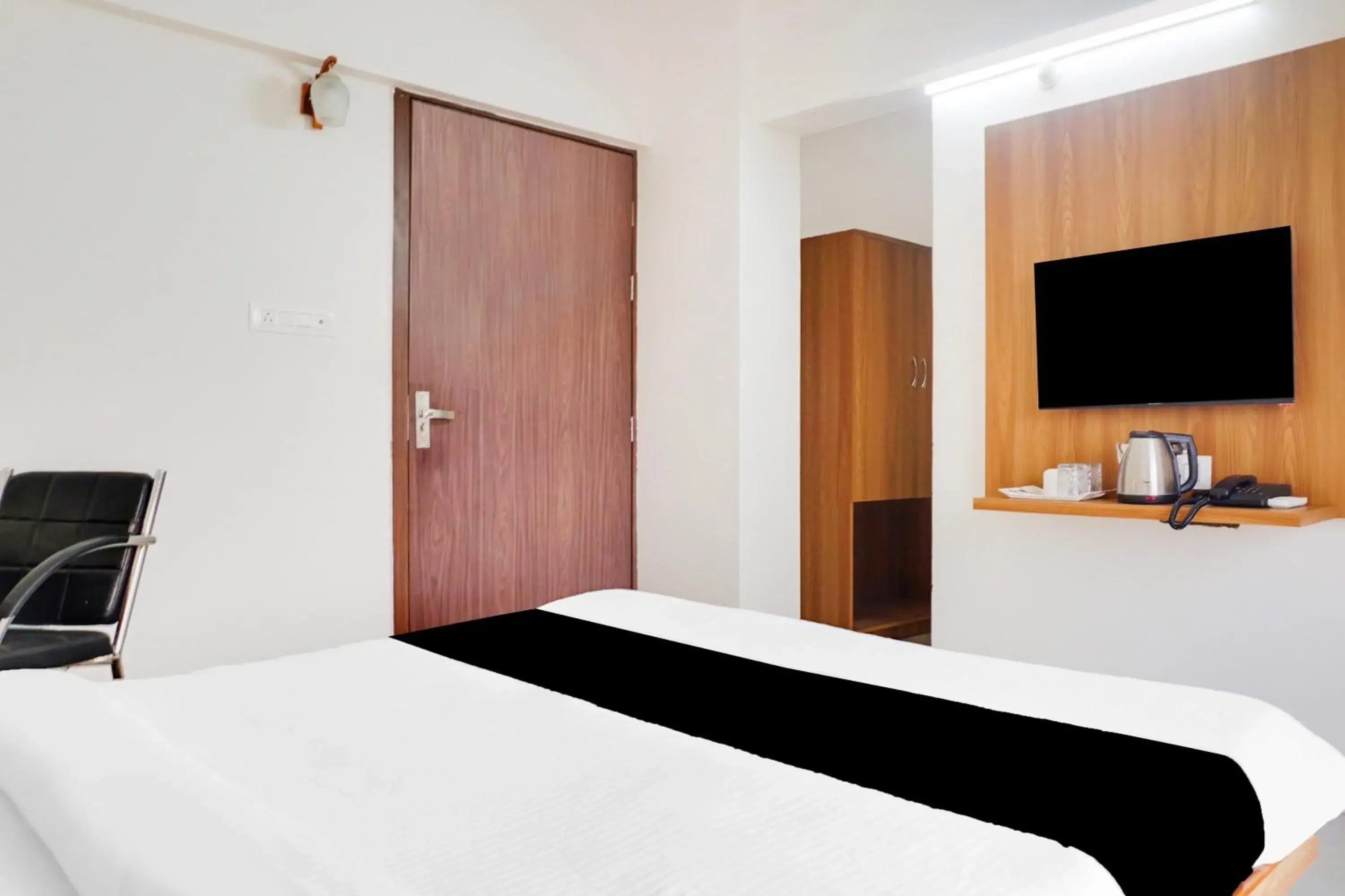 Classic Triple Room - single occupancy in Super Townhouse Lohegaon Near Pune Airport formerly Landmark Regency Classic Triple Room - single occupancy in Super Townhouse Lohegaon Near Pune Airport formerly Landmark Regency