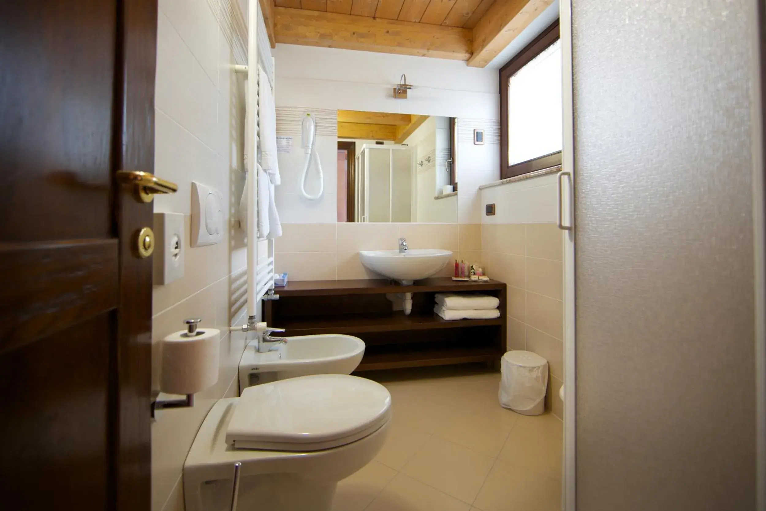 Triple Room in Hotel L' Aiglon Triple Room in Hotel L' Aiglon