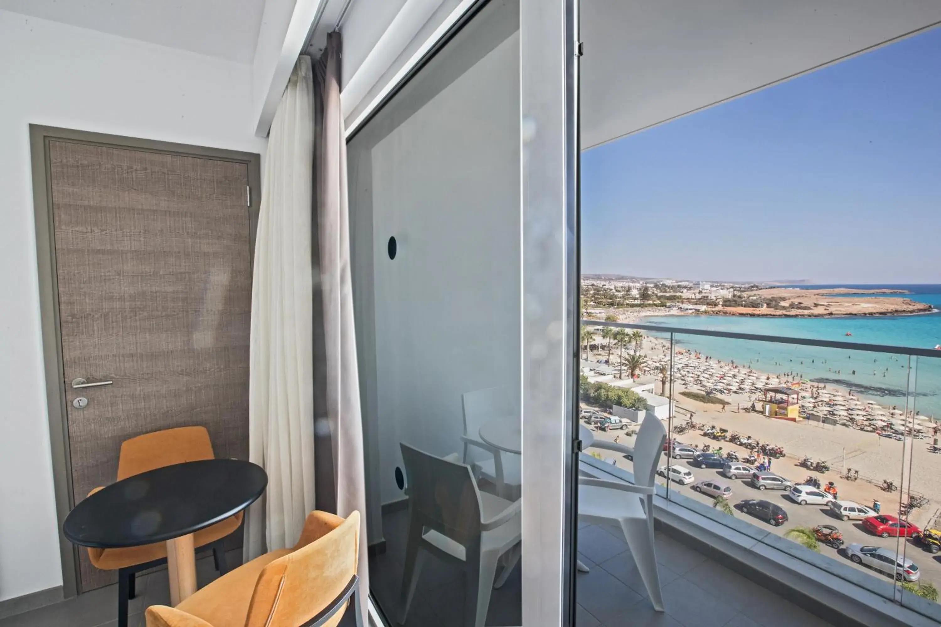 Deluxe Double or Twin Room with Side Sea View in Vassos Nissi Plage Hotel & Spa Deluxe Double or Twin Room with Side Sea View in Vassos Nissi Plage Hotel & Spa