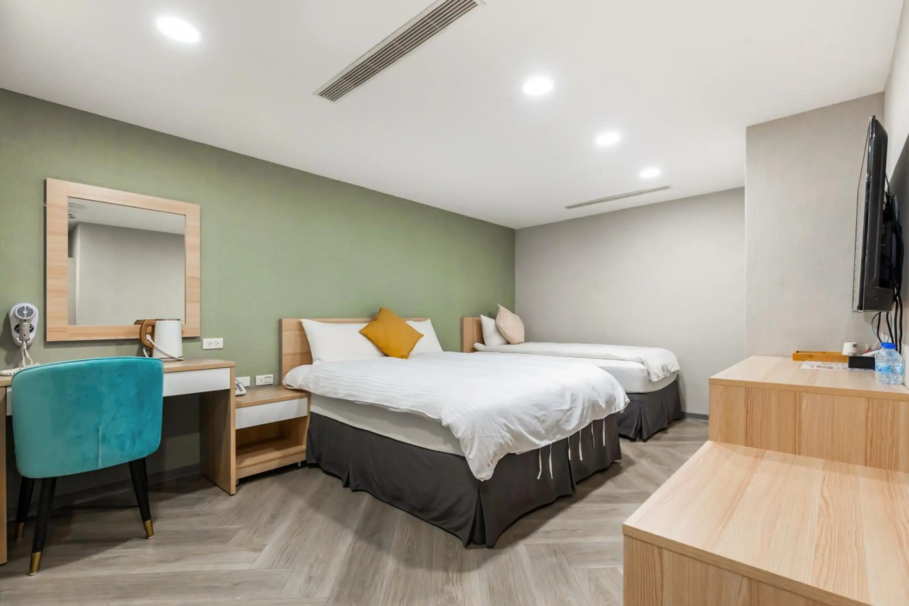 Classic Triple Room in Mu Chen Hotel Classic Triple Room in Mu Chen Hotel