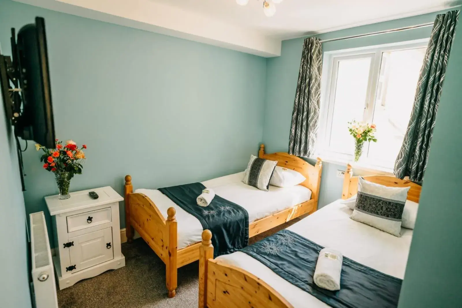 Deluxe Quadruple Room in OYO Minerva Guesthouse Deluxe Quadruple Room in OYO Minerva Guesthouse