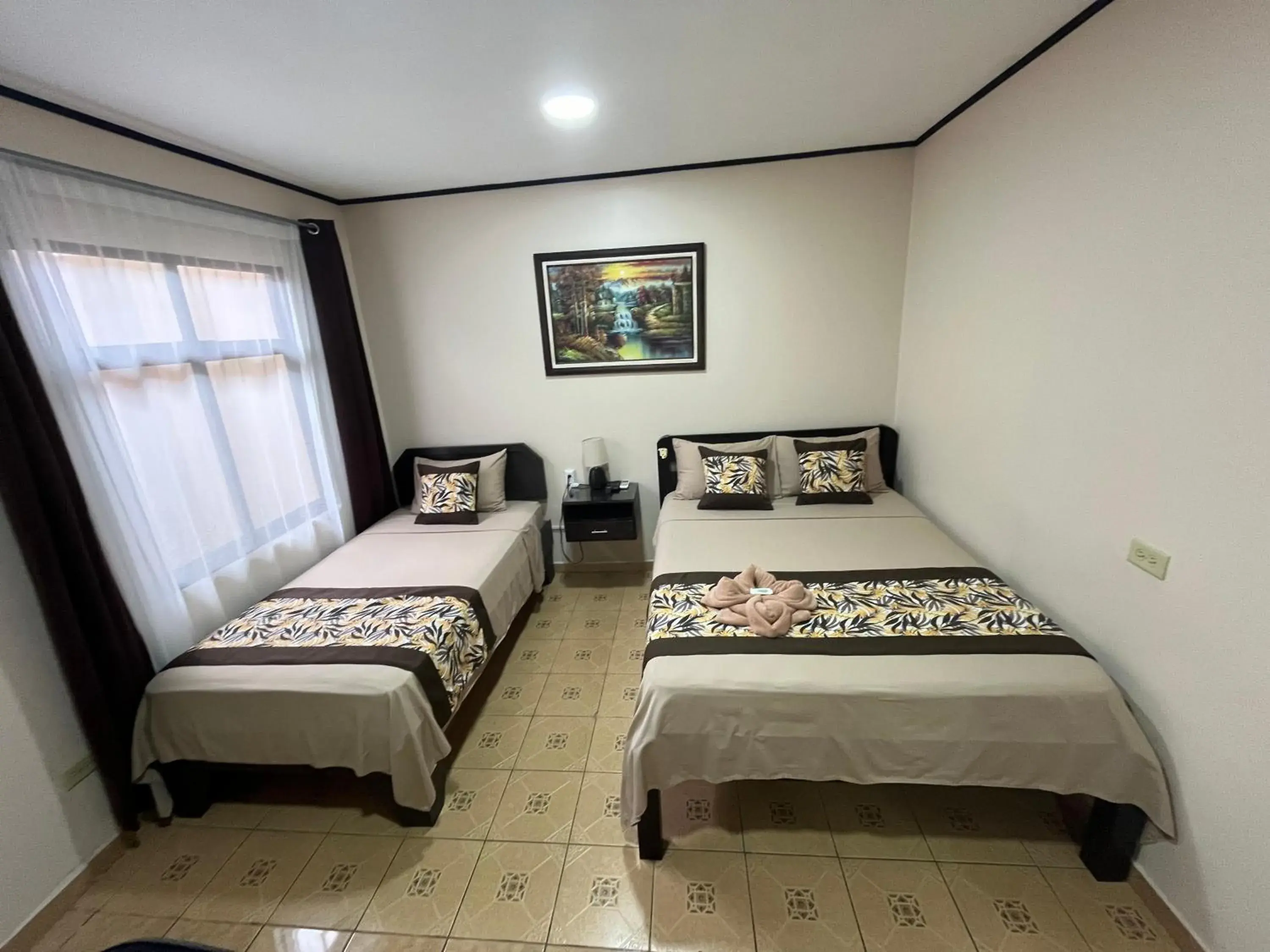 Triple Room in HOTEL DEL RiO Triple Room in HOTEL DEL RiO