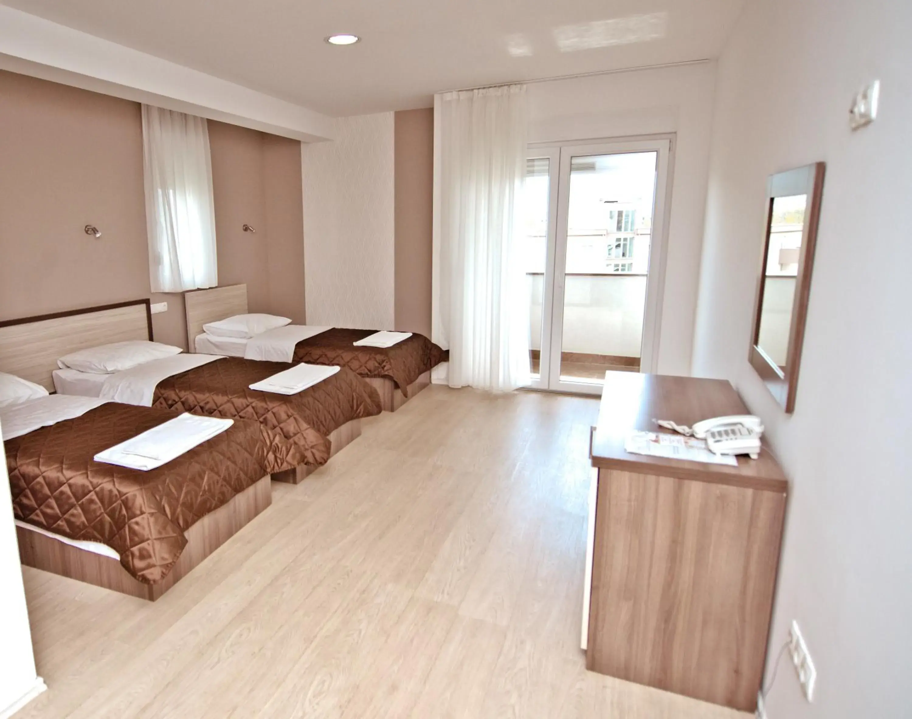 Triple Room with Balcony in Hotel Lux Triple Room with Balcony in Hotel Lux