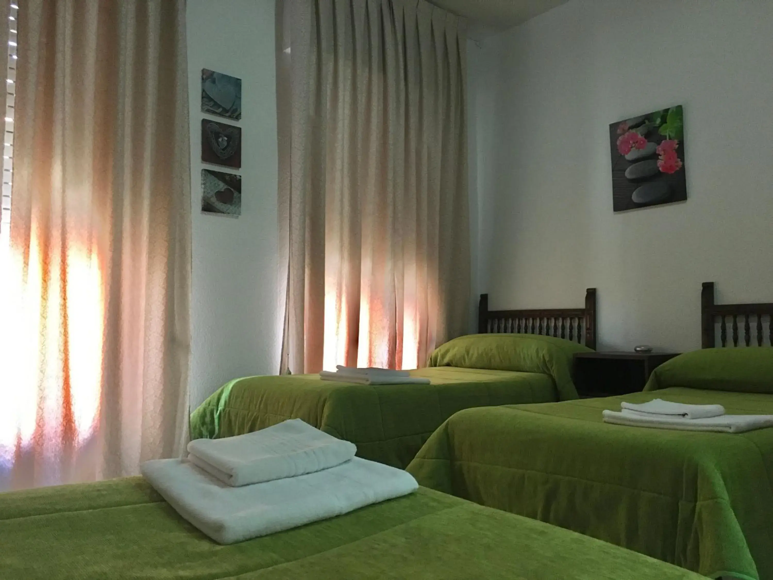 Triple Room in Hostal Santa Barbara Triple Room in Hostal Santa Barbara