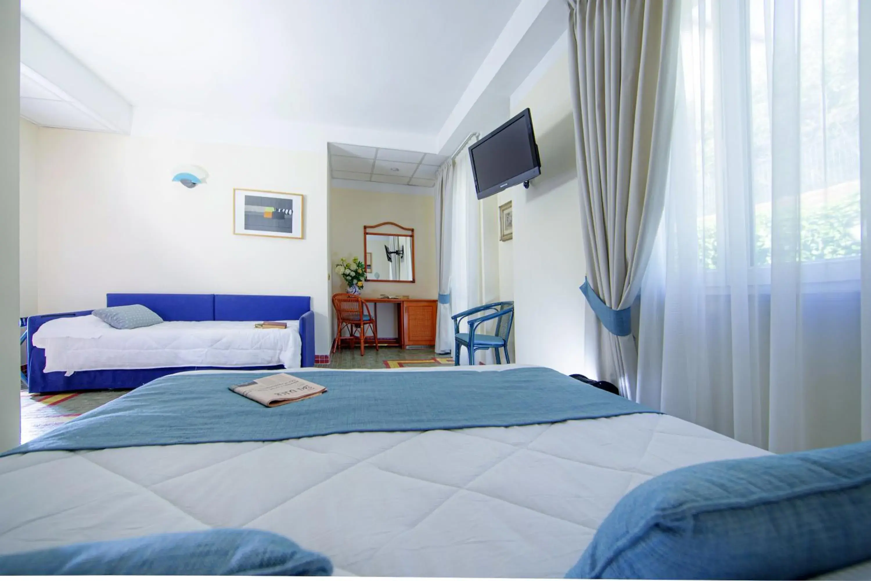 Triple Room in Hotel Della Baia Triple Room in Hotel Della Baia