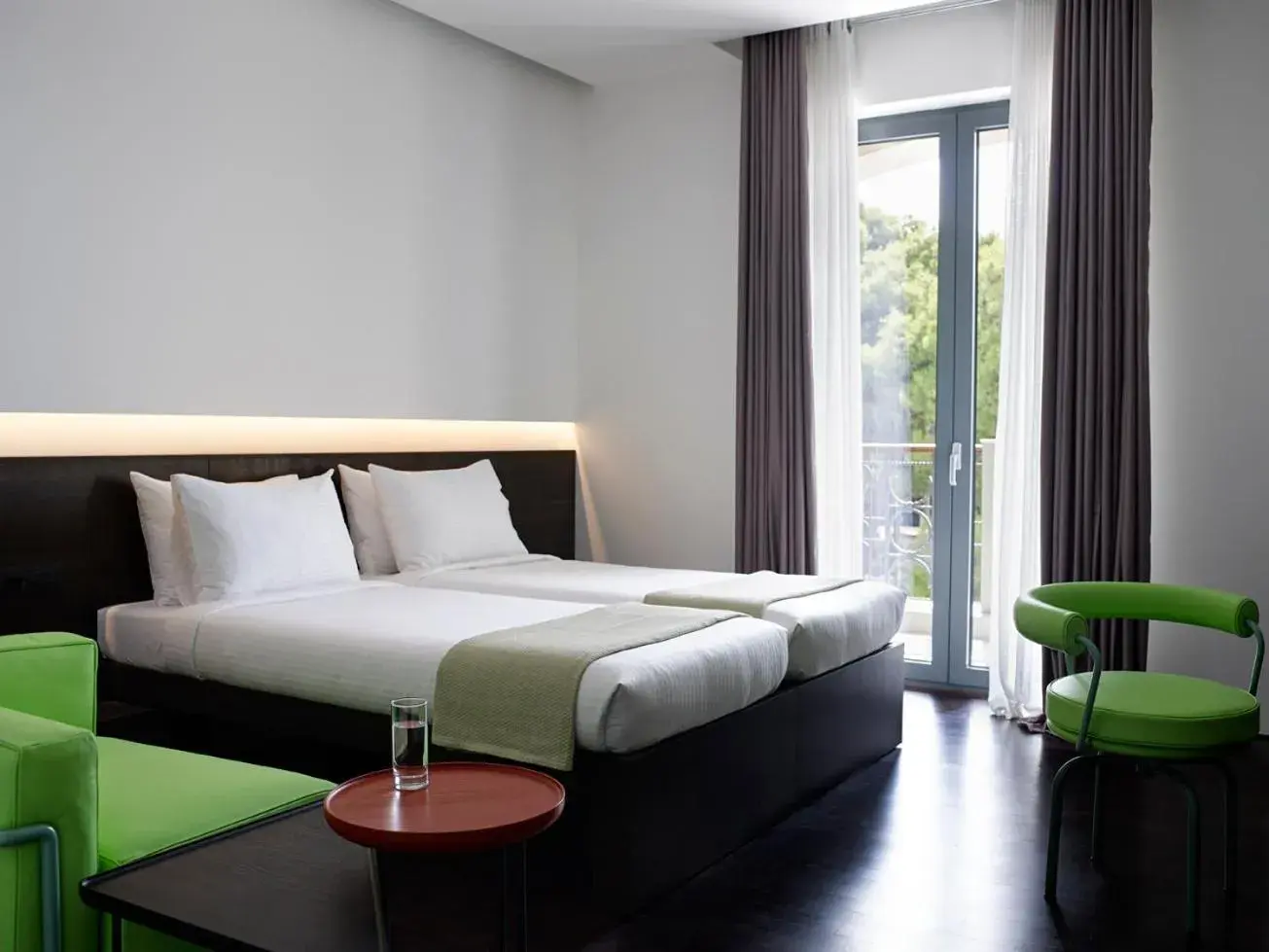 Deluxe Twin Room in Domotel Kastri Deluxe Twin Room in Domotel Kastri