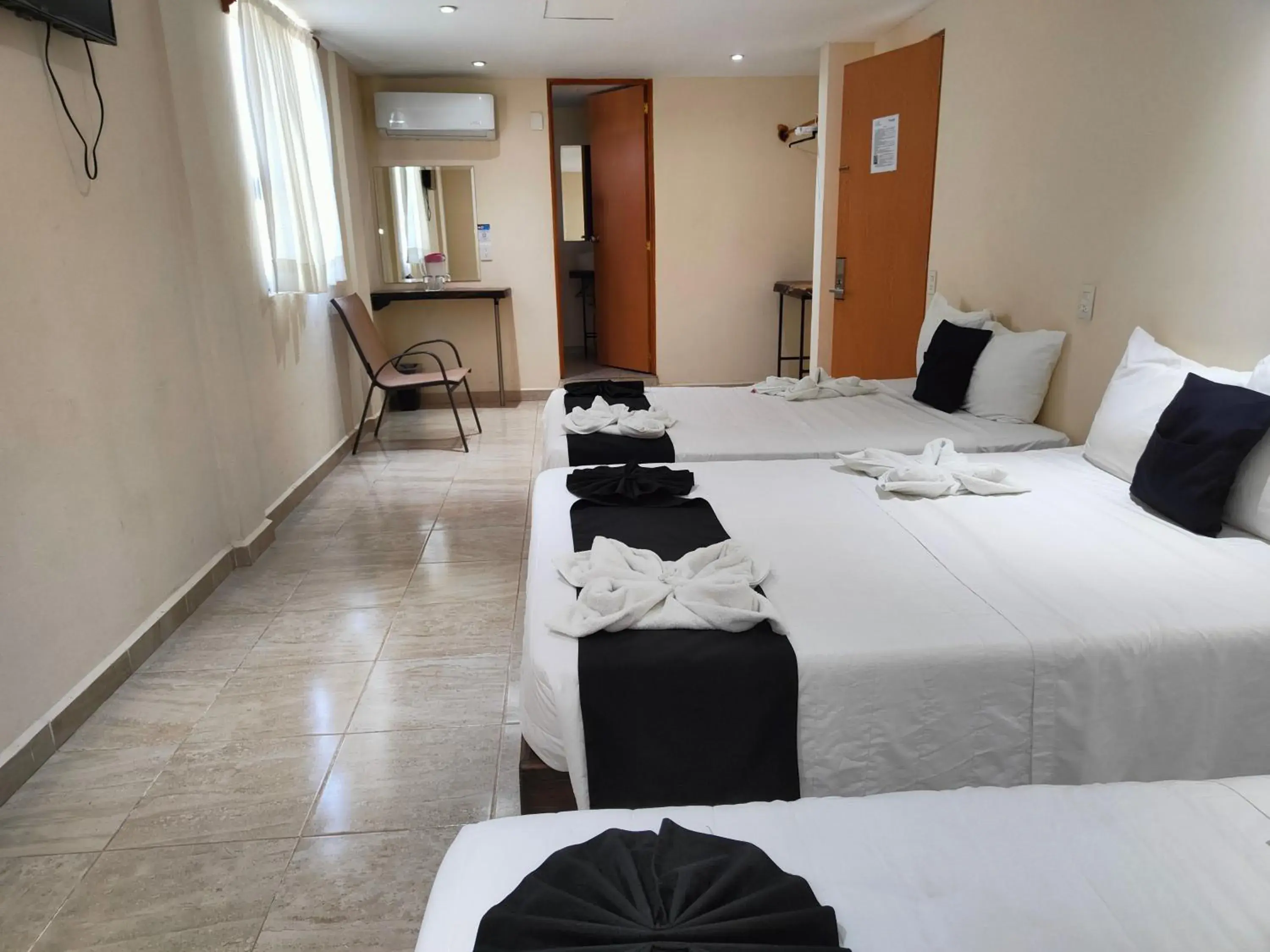 Standard Triple Room in Ashly Loma Larga Standard Triple Room in Ashly Loma Larga