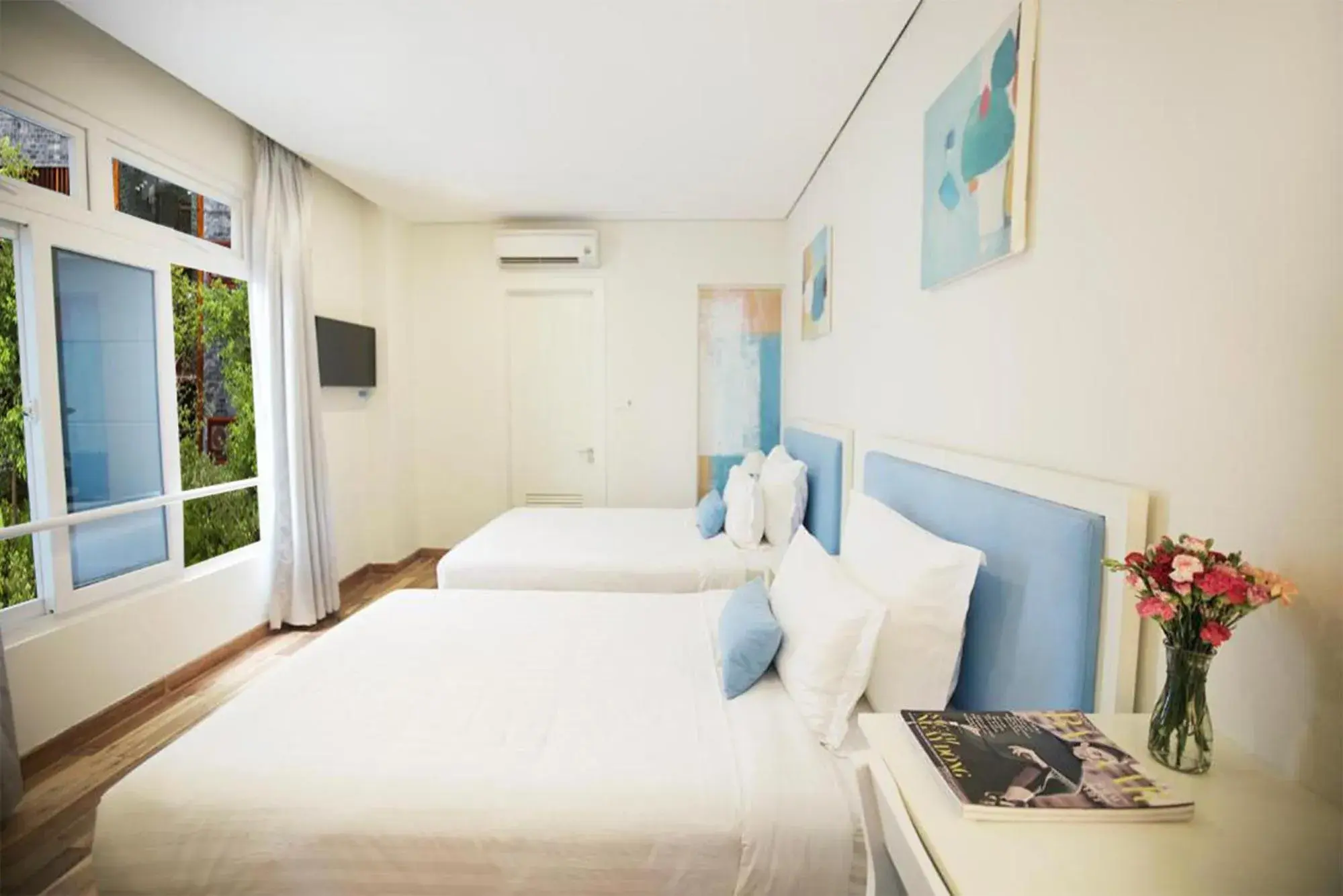 Deluxe Double Room with Two Double Beds in Palmier Hotel - Art House Da Nang Deluxe Double Room with Two Double Beds in Palmier Hotel - Art House Da Nang