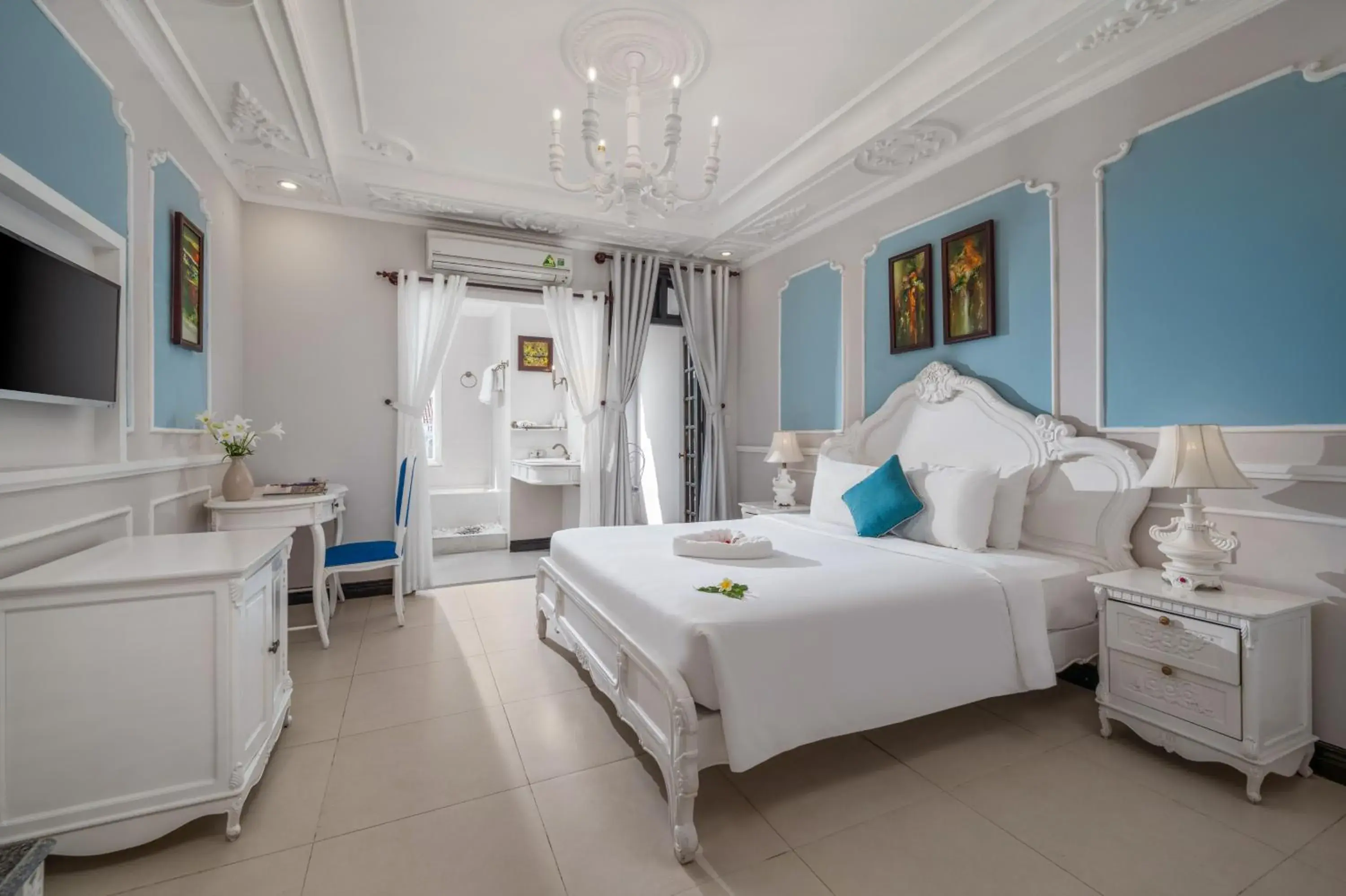 Family Room (4 Adults) with Balcony in Hoi An Garden Palace and Spa - A Boutique Inspired by Nature Family Room (4 Adults) with Balcony in Hoi An Garden Palace and Spa - A Boutique Inspired by Nature