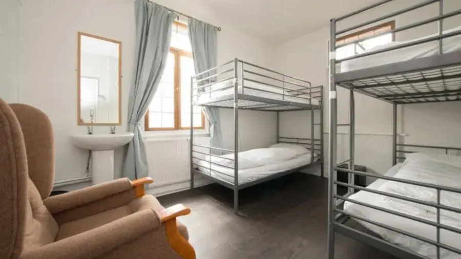 Bed in 4-Bed Mixed Dormitory Room in The Walrus Bar and Hostel Bed in 4-Bed Mixed Dormitory Room in The Walrus Bar and Hostel