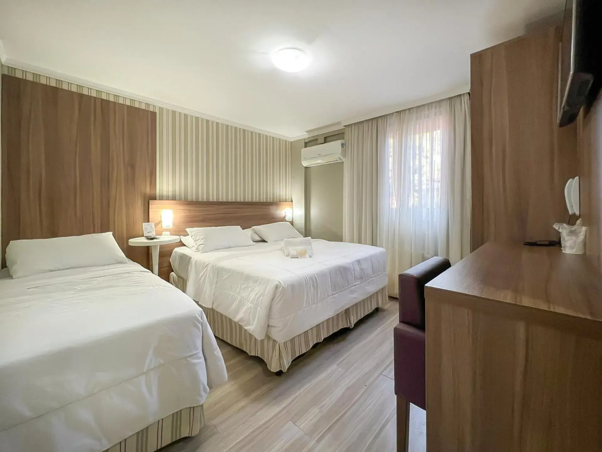 Triple Room in Pousada Viena Triple Room in Pousada Viena