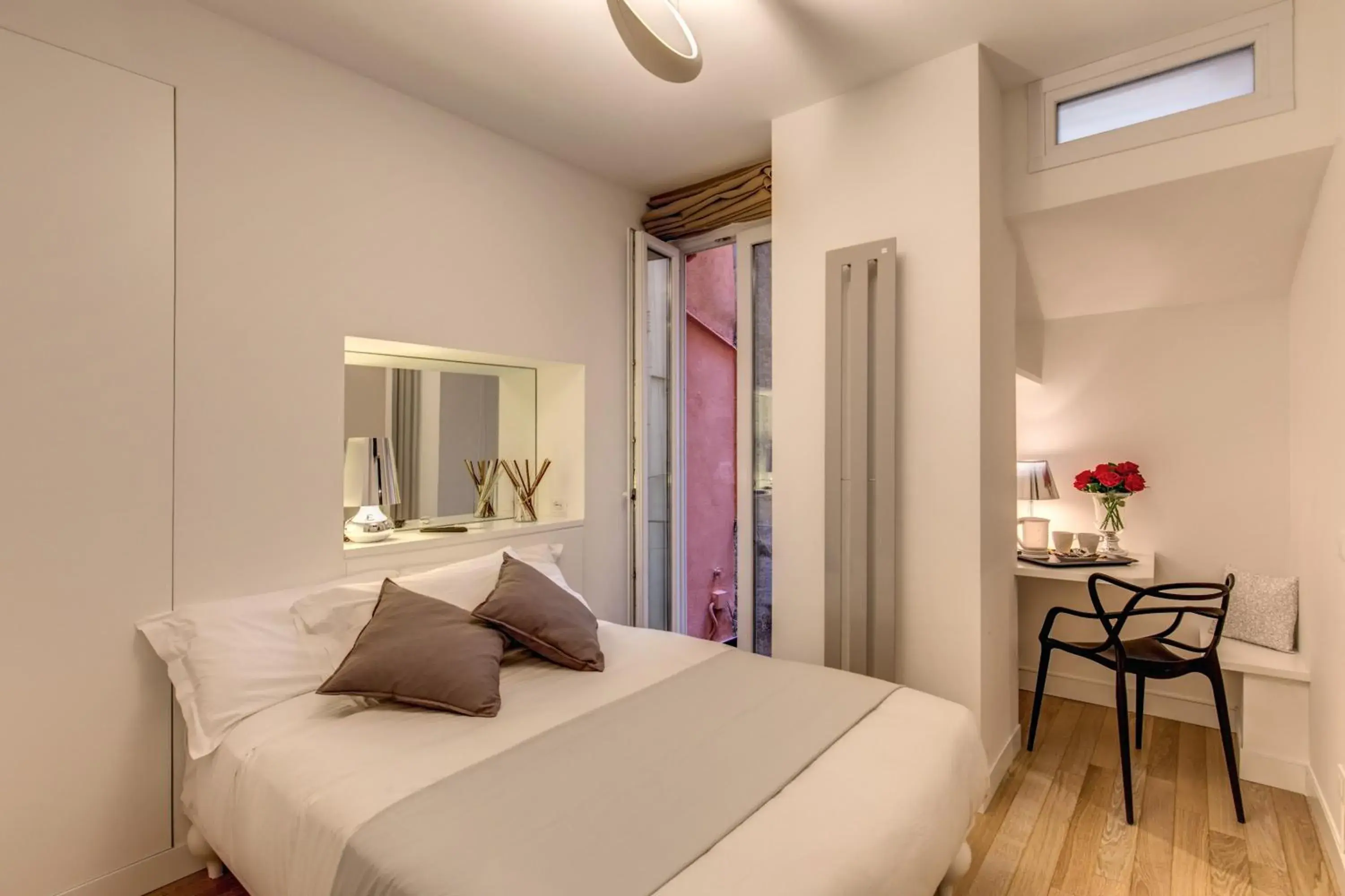 Small Double Room in Orange Suites Small Double Room in Orange Suites