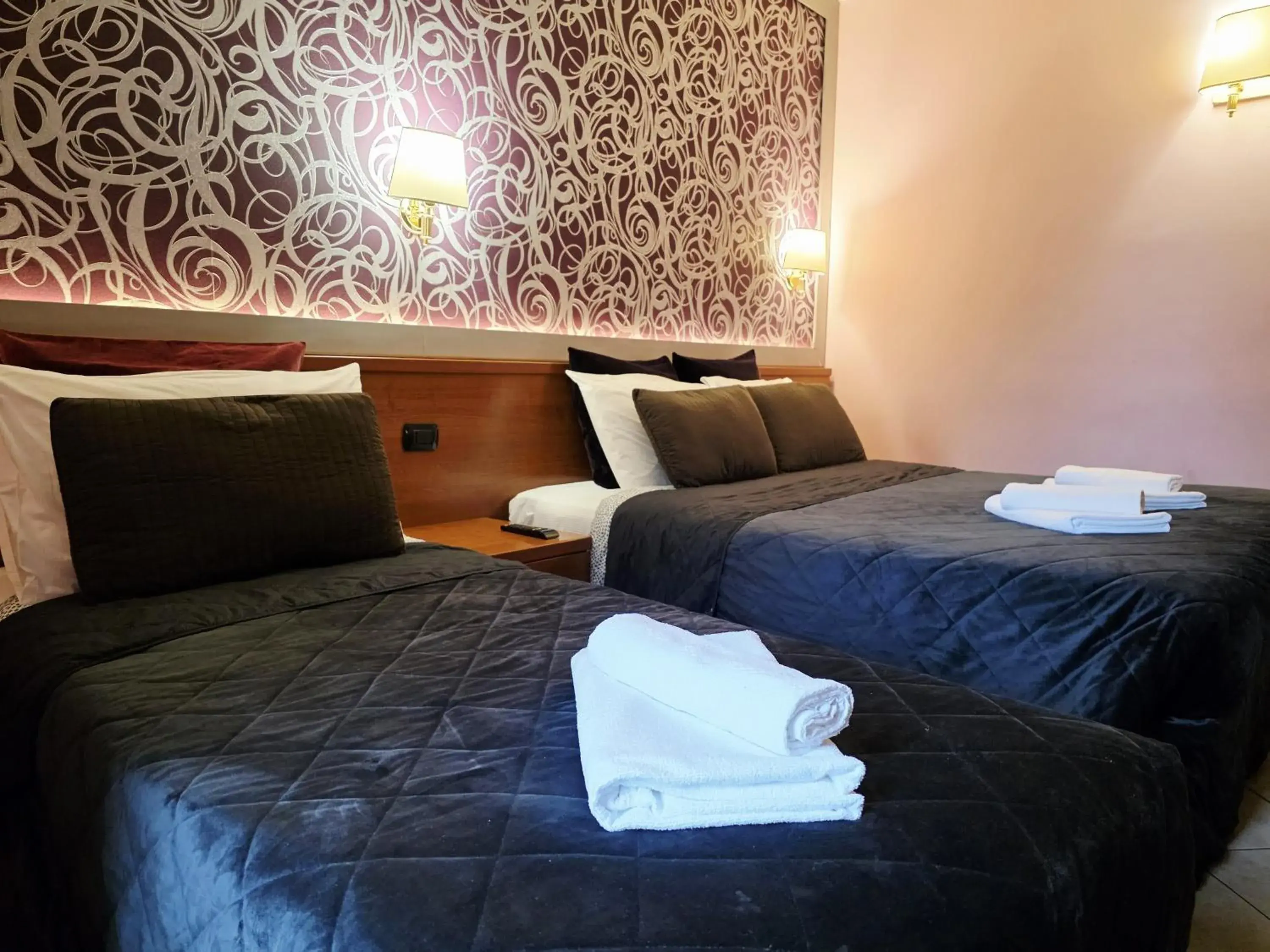 Triple Room in Ad Hoc Domus Colosseo Triple Room in Ad Hoc Domus Colosseo