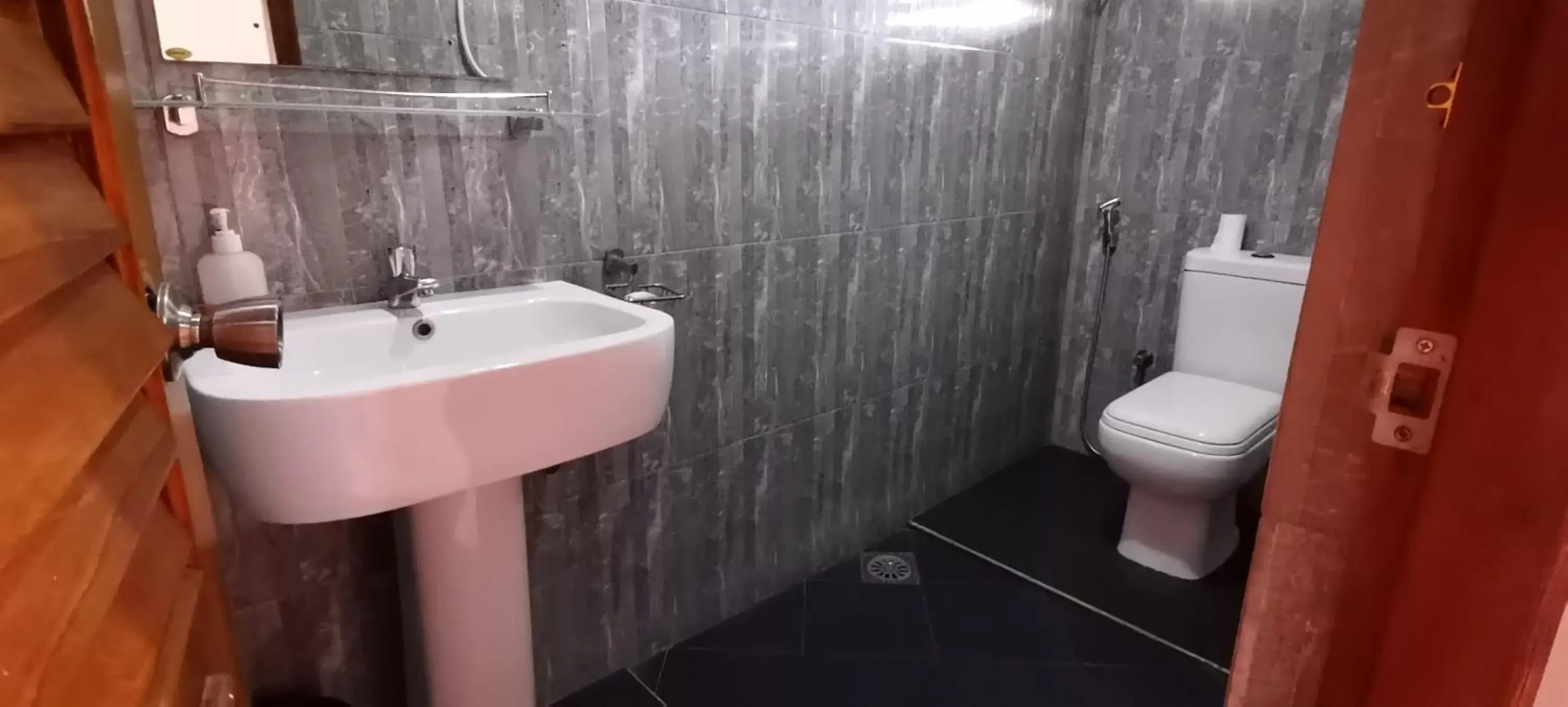 Deluxe Triple Room in Rajarata Family Resort Deluxe Triple Room in Rajarata Family Resort