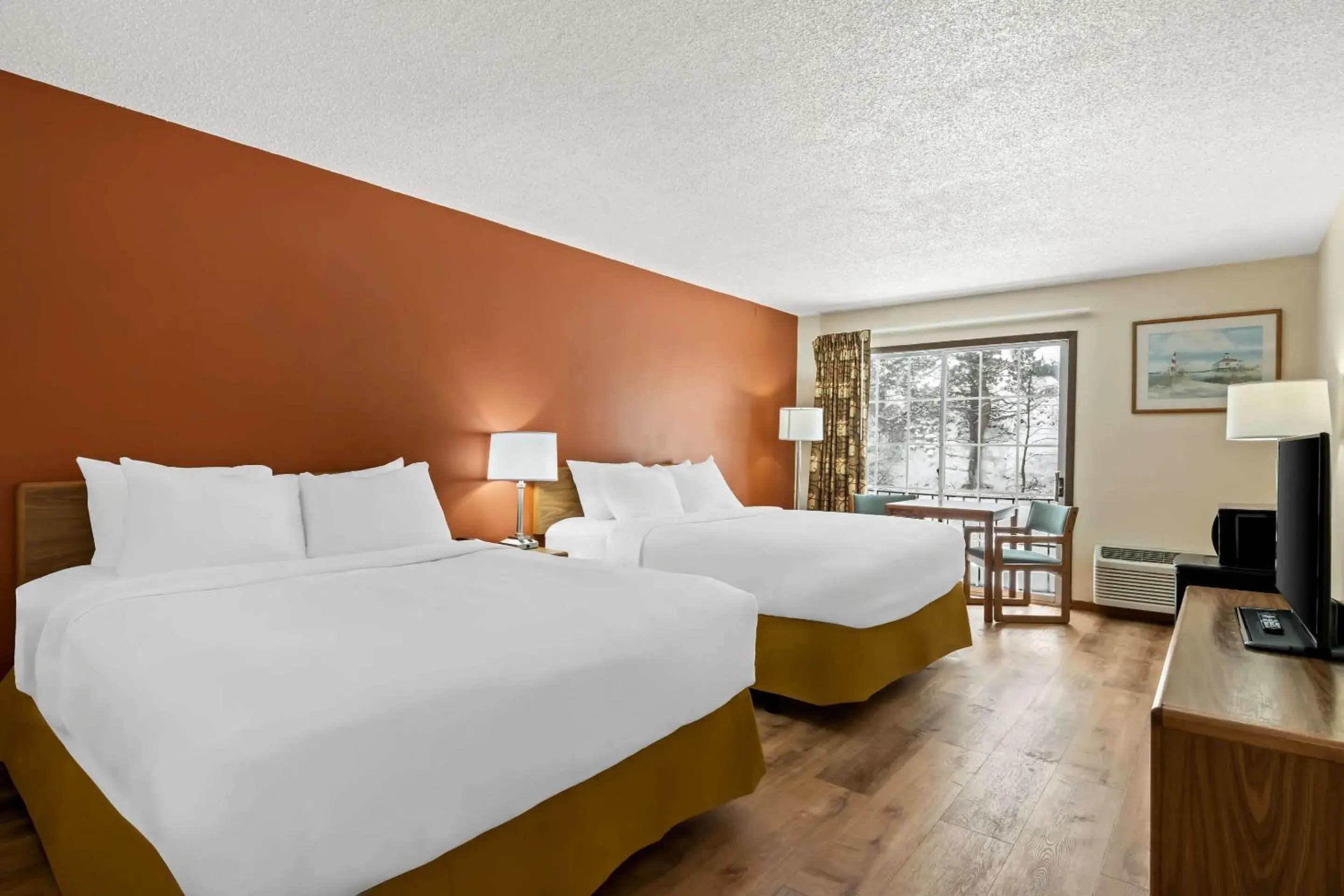 Quadruple Room with Two Queen Beds - Non Smoking/Interior Hall in Econo Lodge Manistee Quadruple Room with Two Queen Beds - Non Smoking/Interior Hall in Econo Lodge Manistee