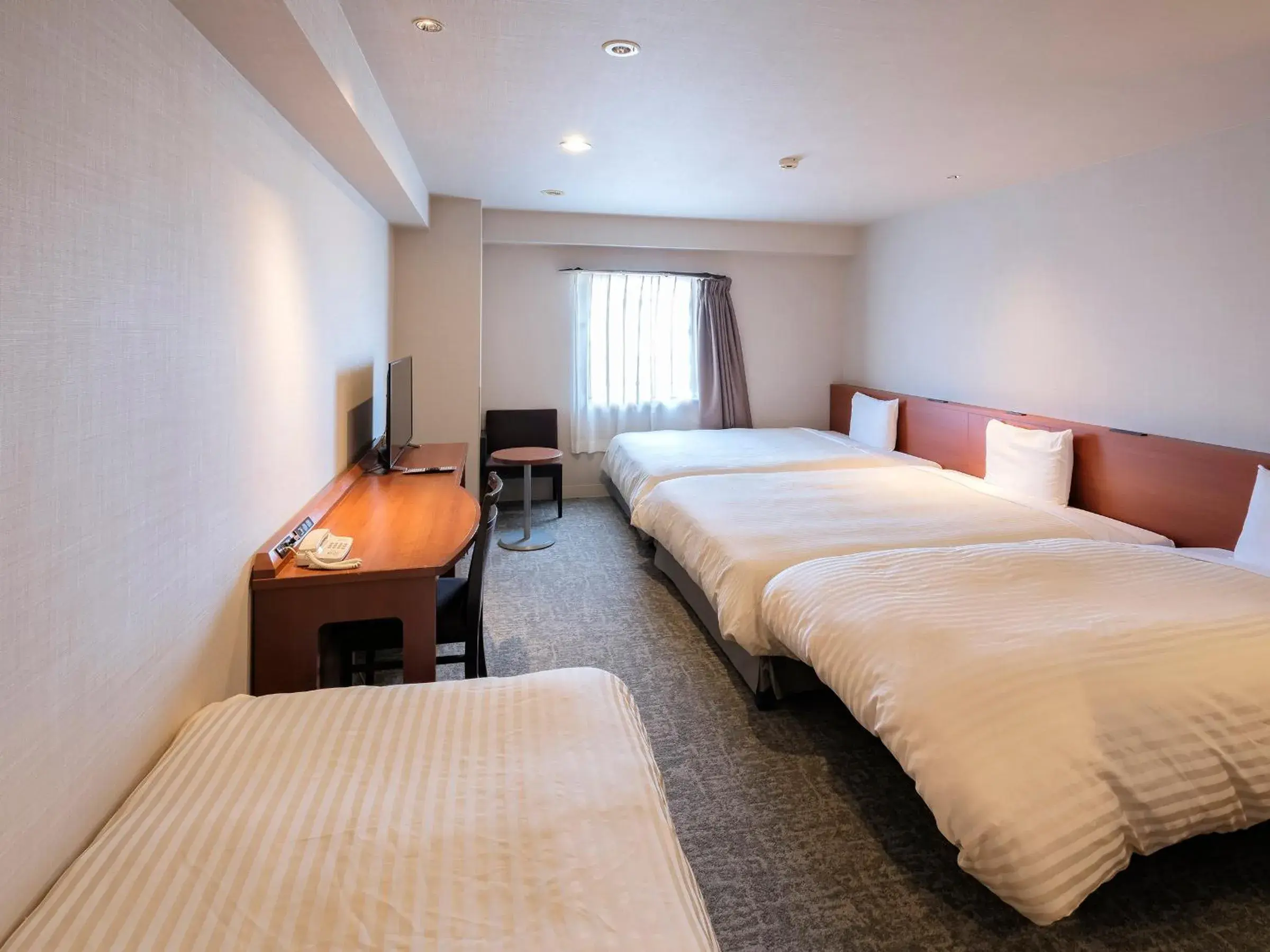 Comfort Twin Room with 2 Extra Beds - Non-Smoking in Vessel Hotel Miyakonojo Comfort Twin Room with 2 Extra Beds - Non-Smoking in Vessel Hotel Miyakonojo